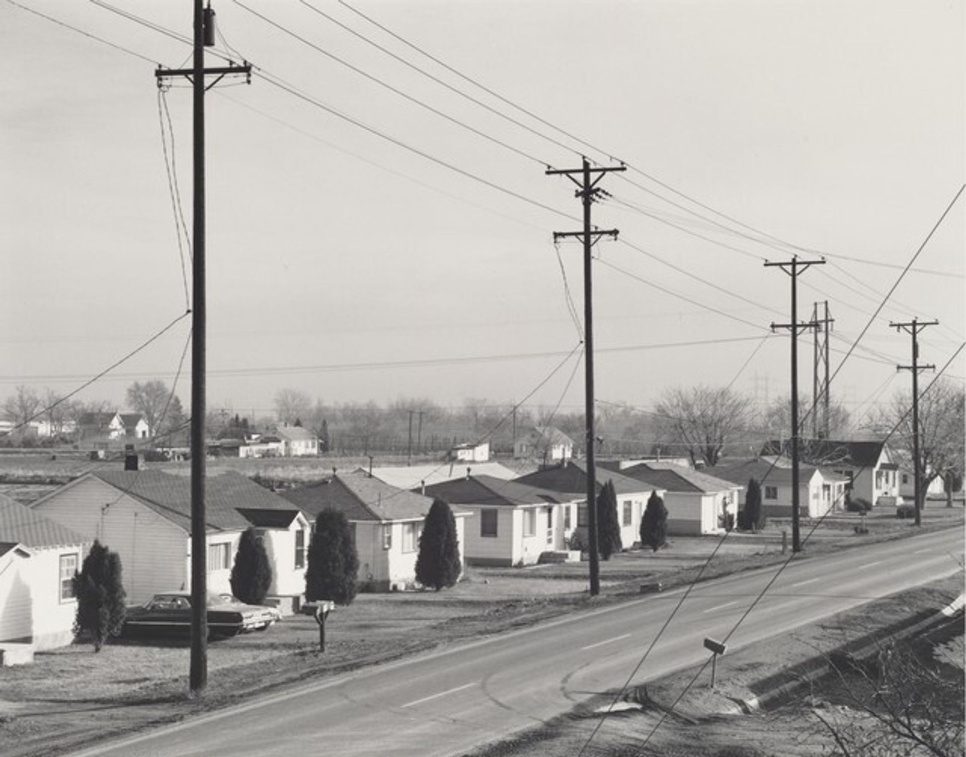Housing adjacent to an elevated freeway, Denver, Colorado by Robert Adams