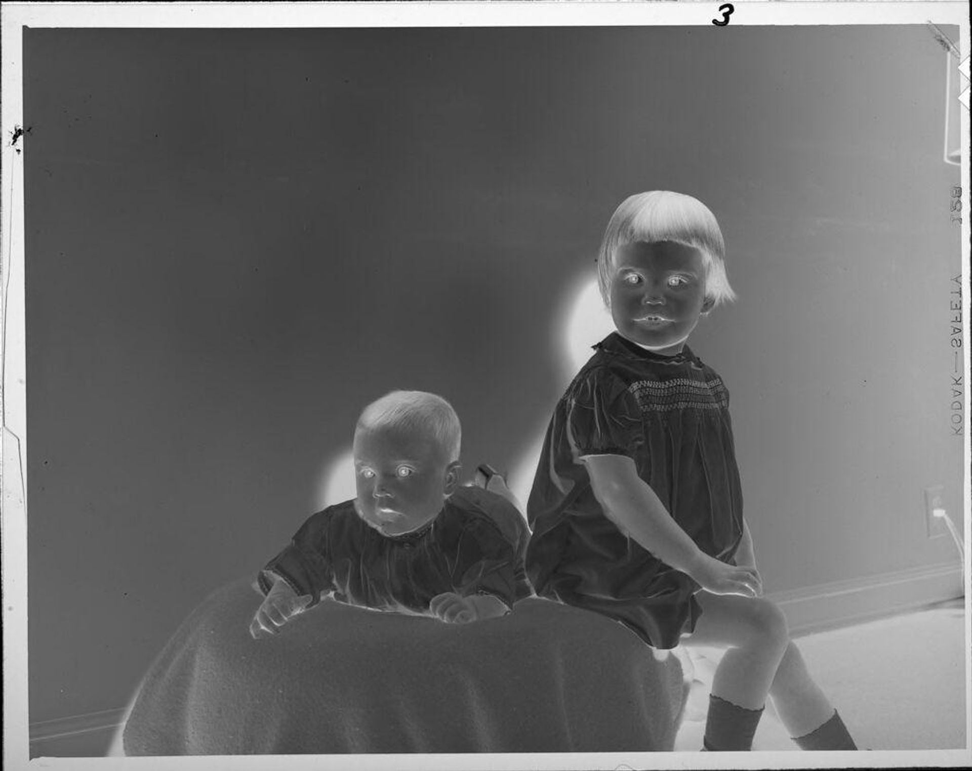 Untitled (portrait of little girl and baby) by Lucian and Mary Brown