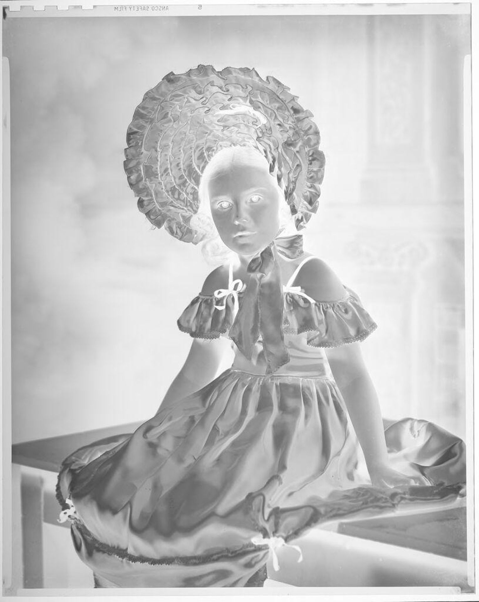 Untitled (girl in tall ruffled hat and dress) by Hamblin Studio