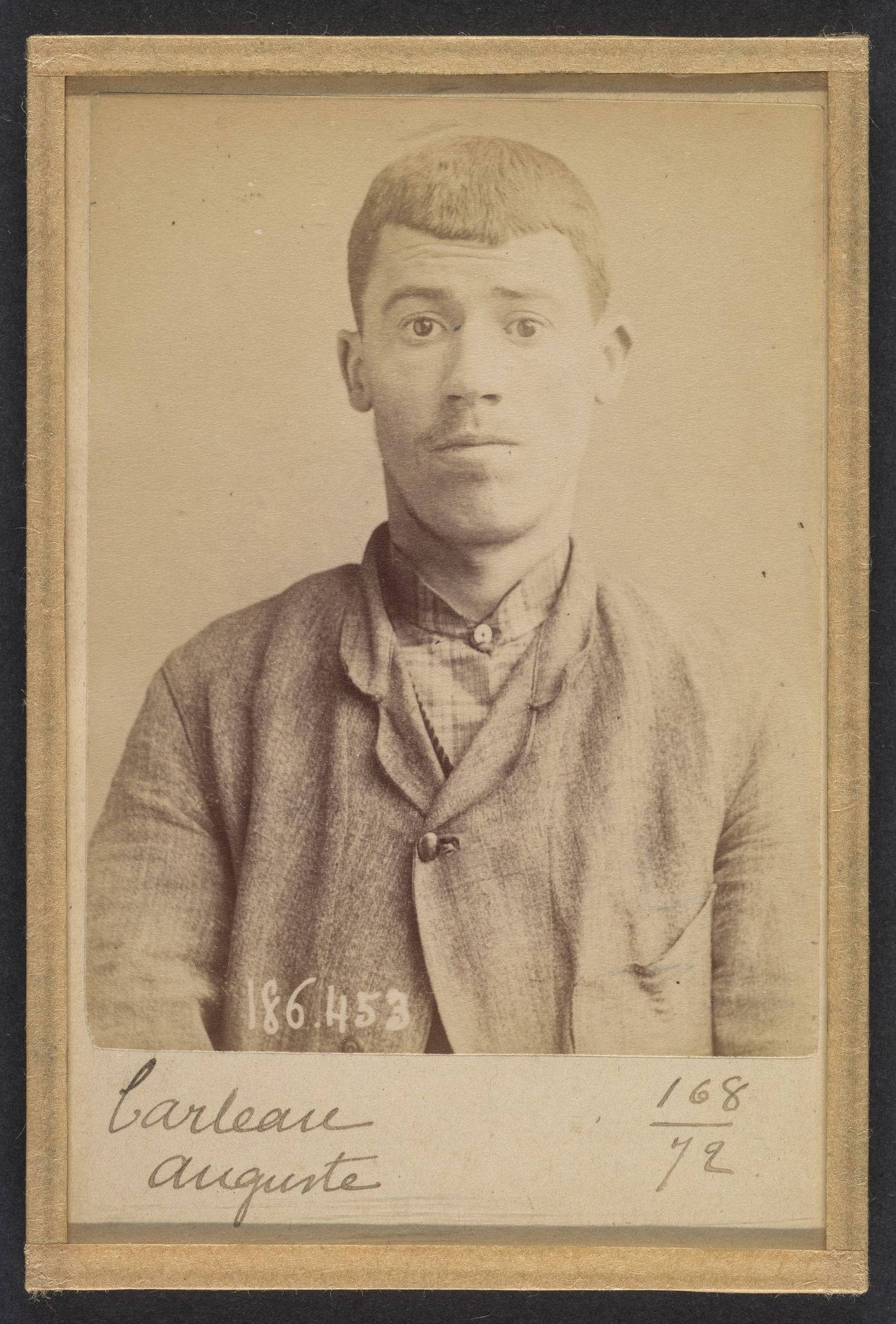 Carteau. Auguste. 23 ans, né à St-Florent (Cher). Verrier. Anarchiste. 1/5/92. by Alphonse Bertillon