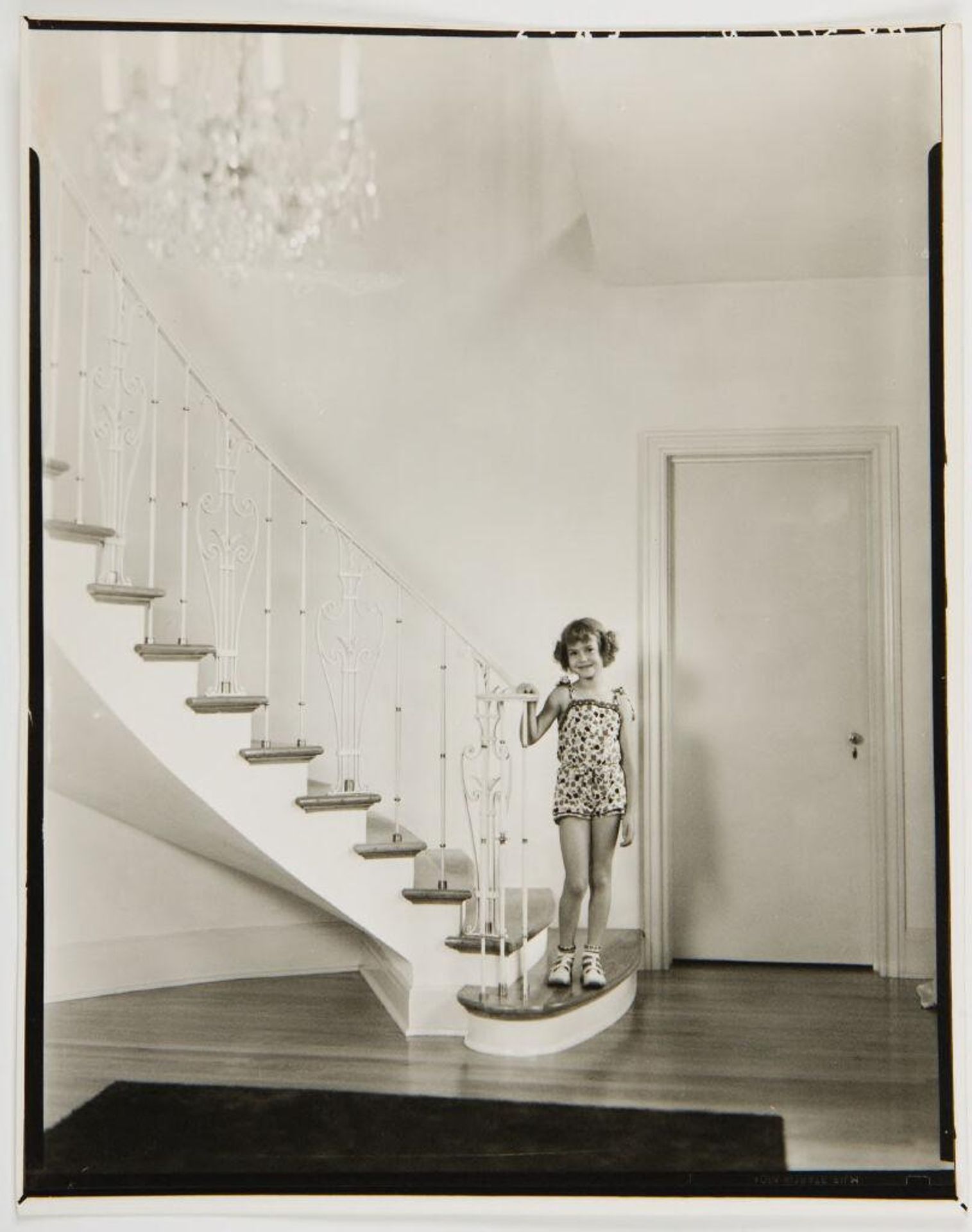 Untitled (girl at bottom of staircase) by Paul Gittings