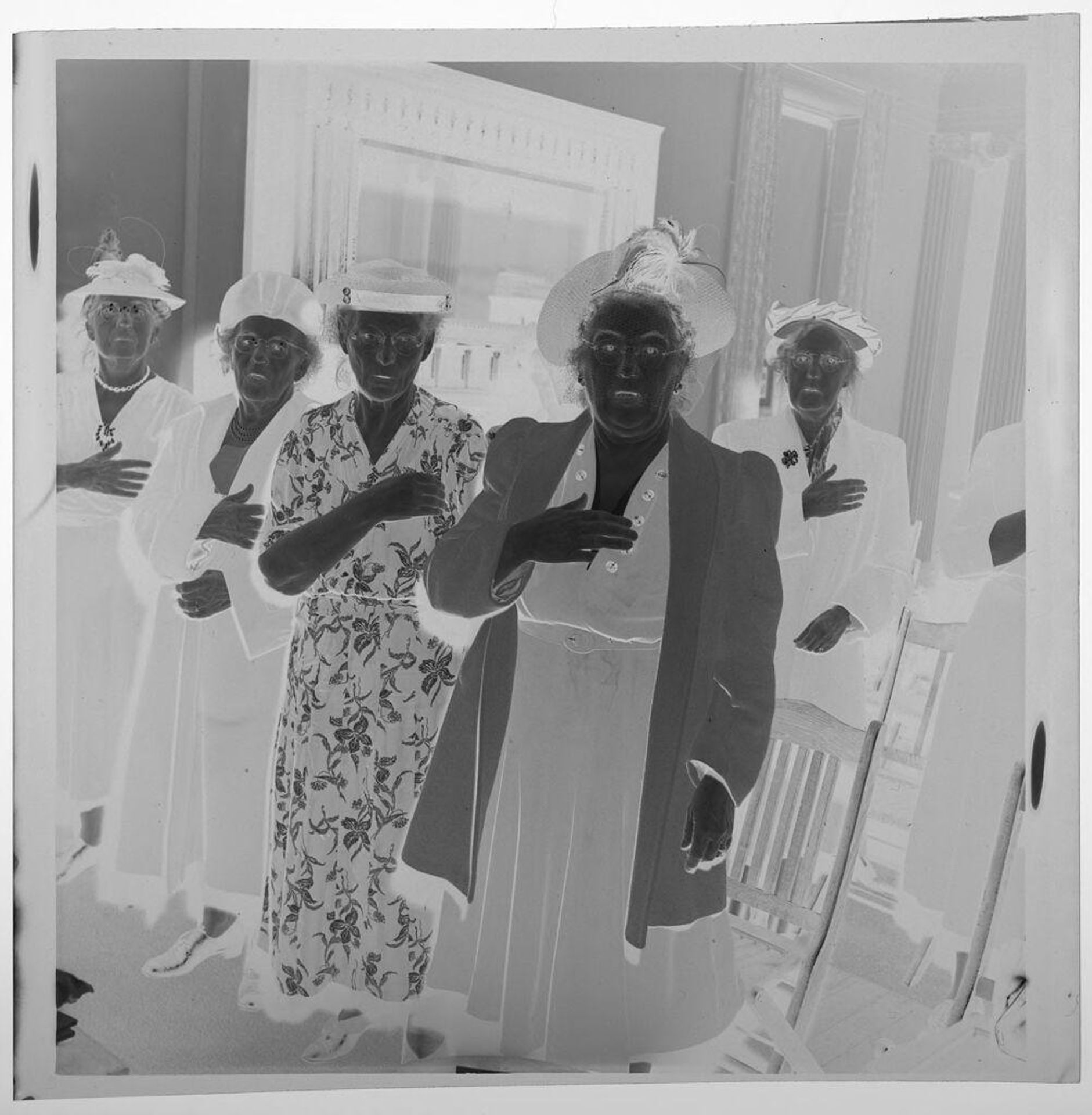 Untitled (woman saying pledge of allegiance at DAR meeting) by Jack Gould