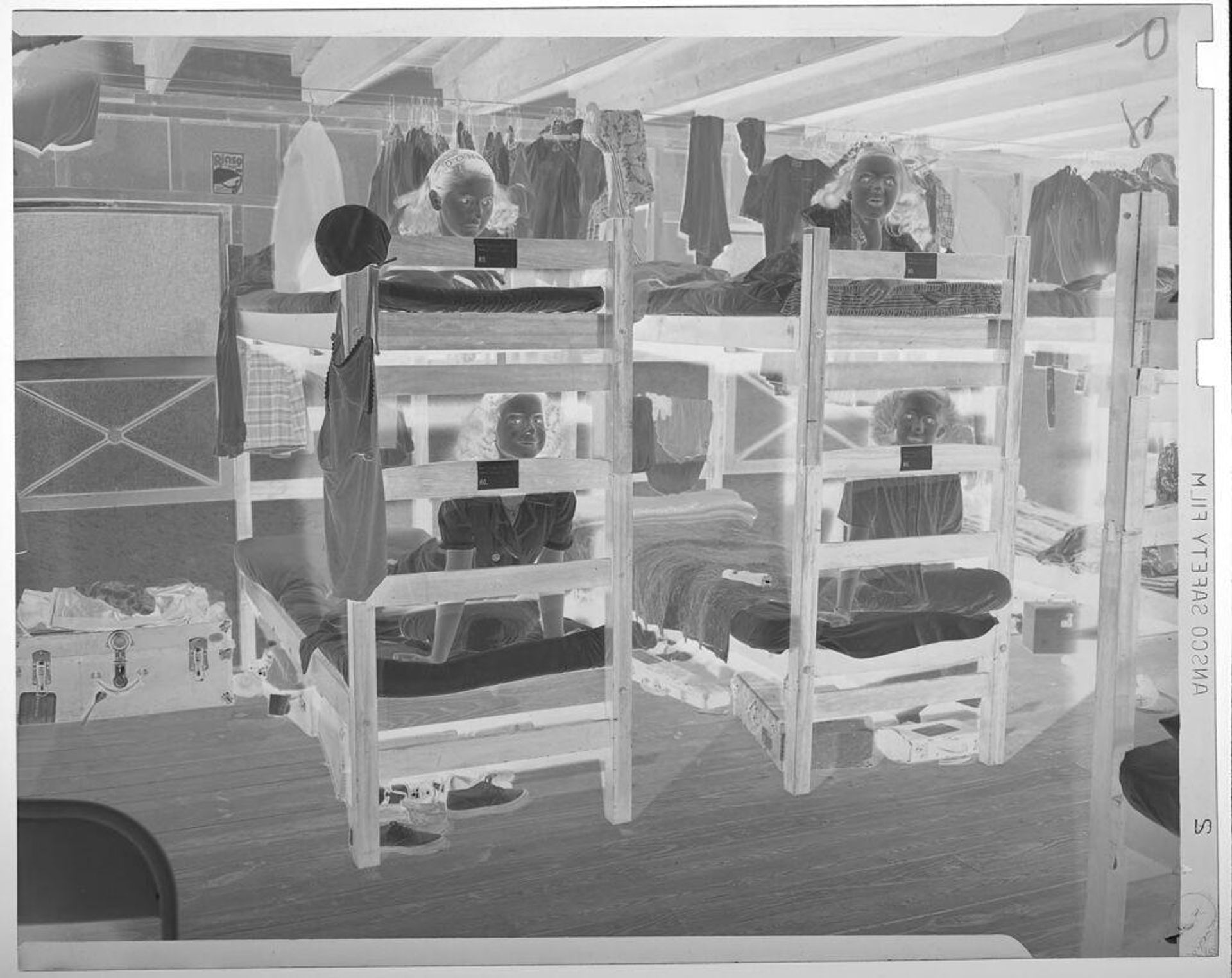 Untitled (four girls on camp bunk beds) by Jack Gould