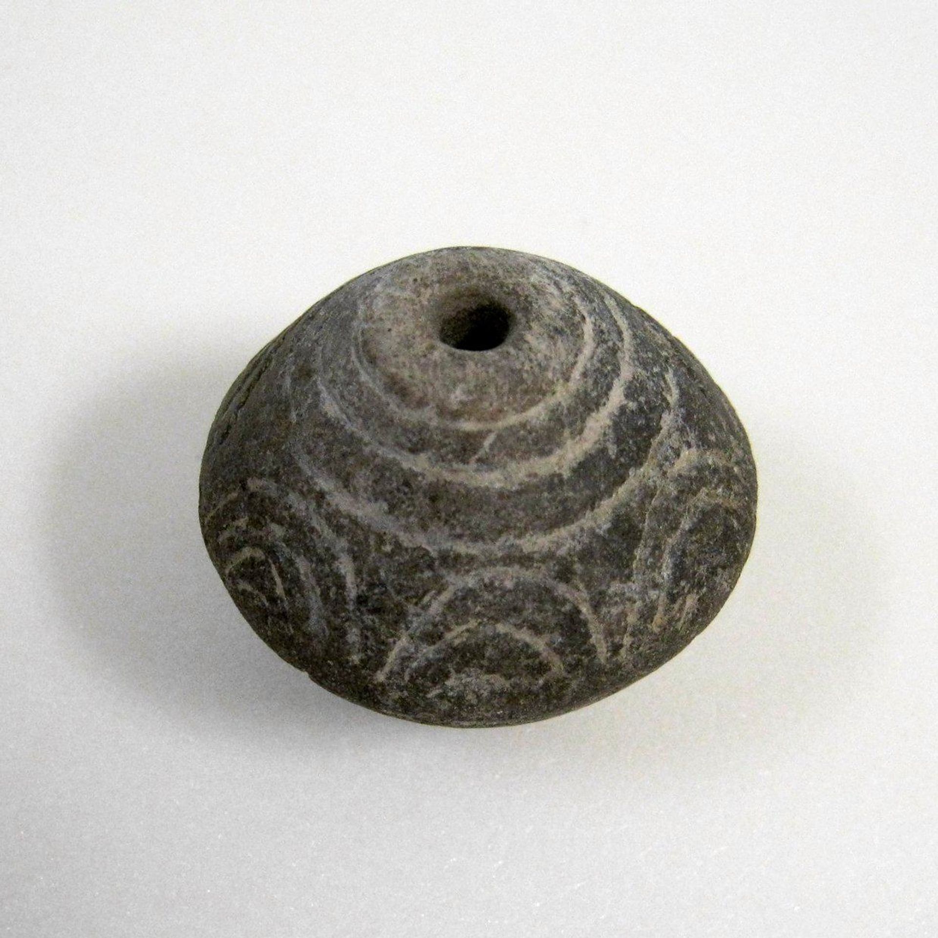 Spindle Whorl by Anonymous