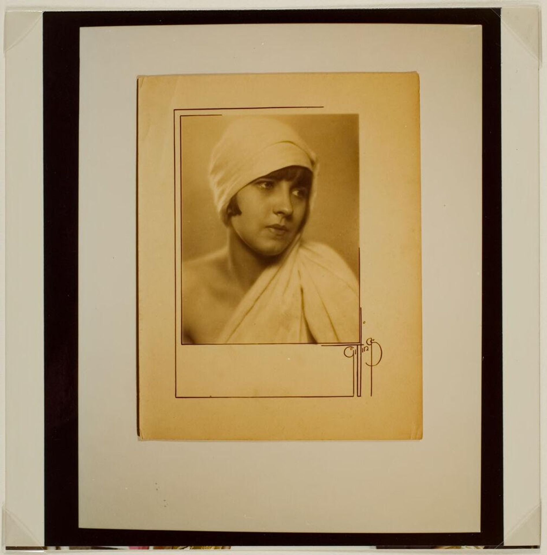 Untitled (photograph of woman with white cloth over head, one shoulder) by Paul Gittings