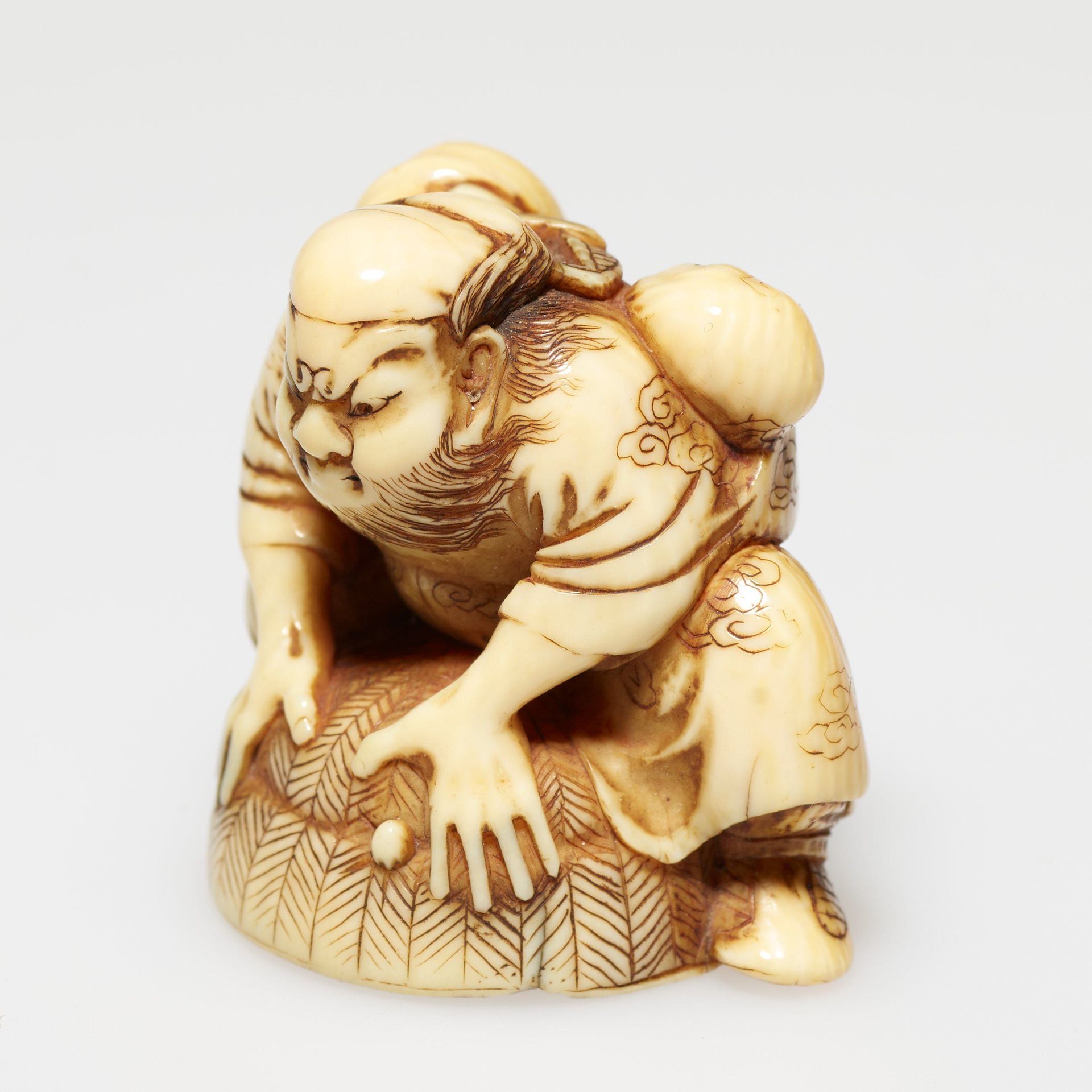 Shōki capturing a demon with a hat by Harumitsu