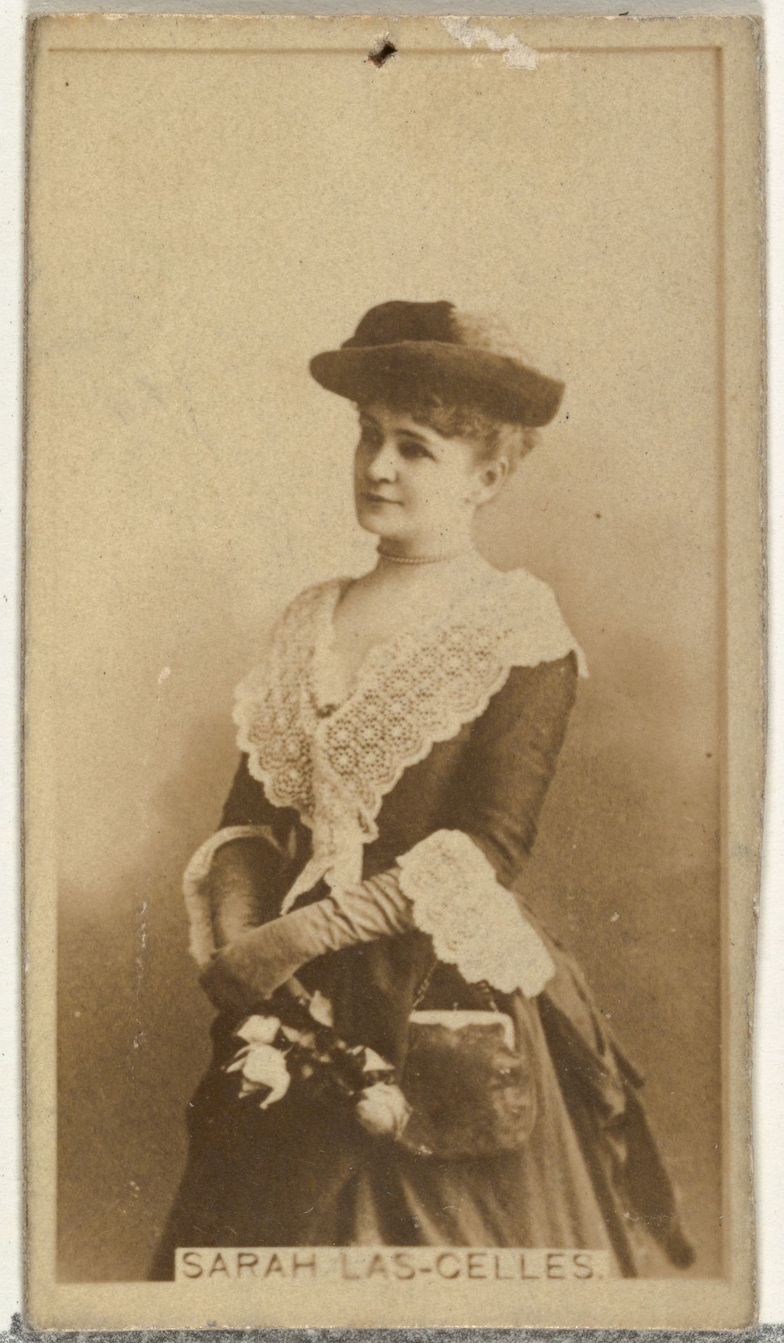 Sarah Las-Gelles, from the Actors and Actresses series (N145-8) issued by Duke Sons & Co. to promote Duke Cigarettes by W. Duke, Sons & Co.