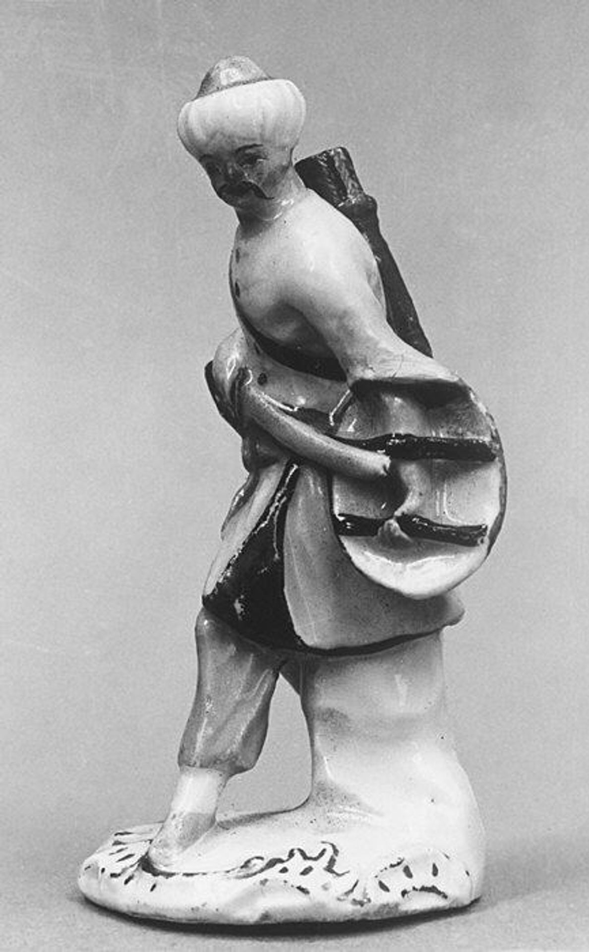 Figure of an Asian man by Meissen Manufactory