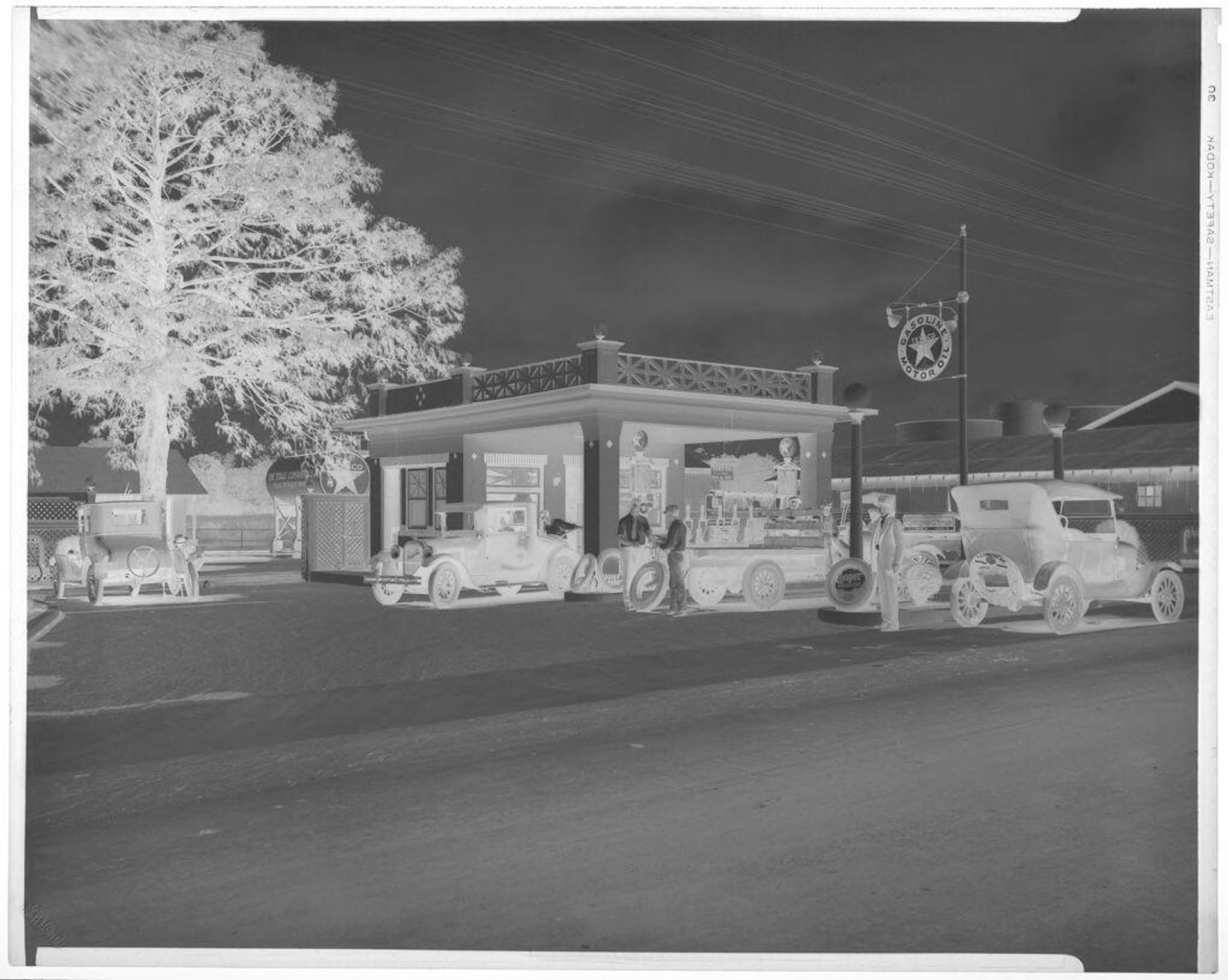 Untitled (Texaco service station seen from street) by Hamblin Studio