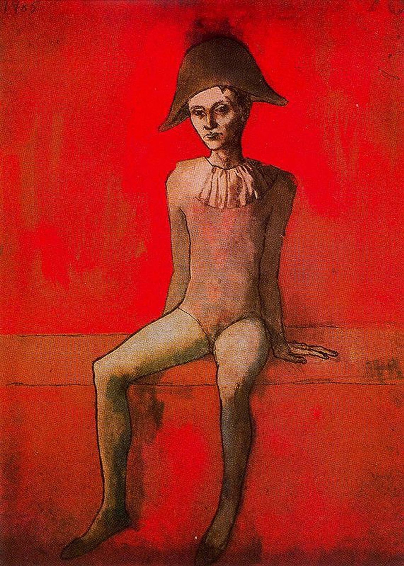 Seated harlequin by Pablo Picasso