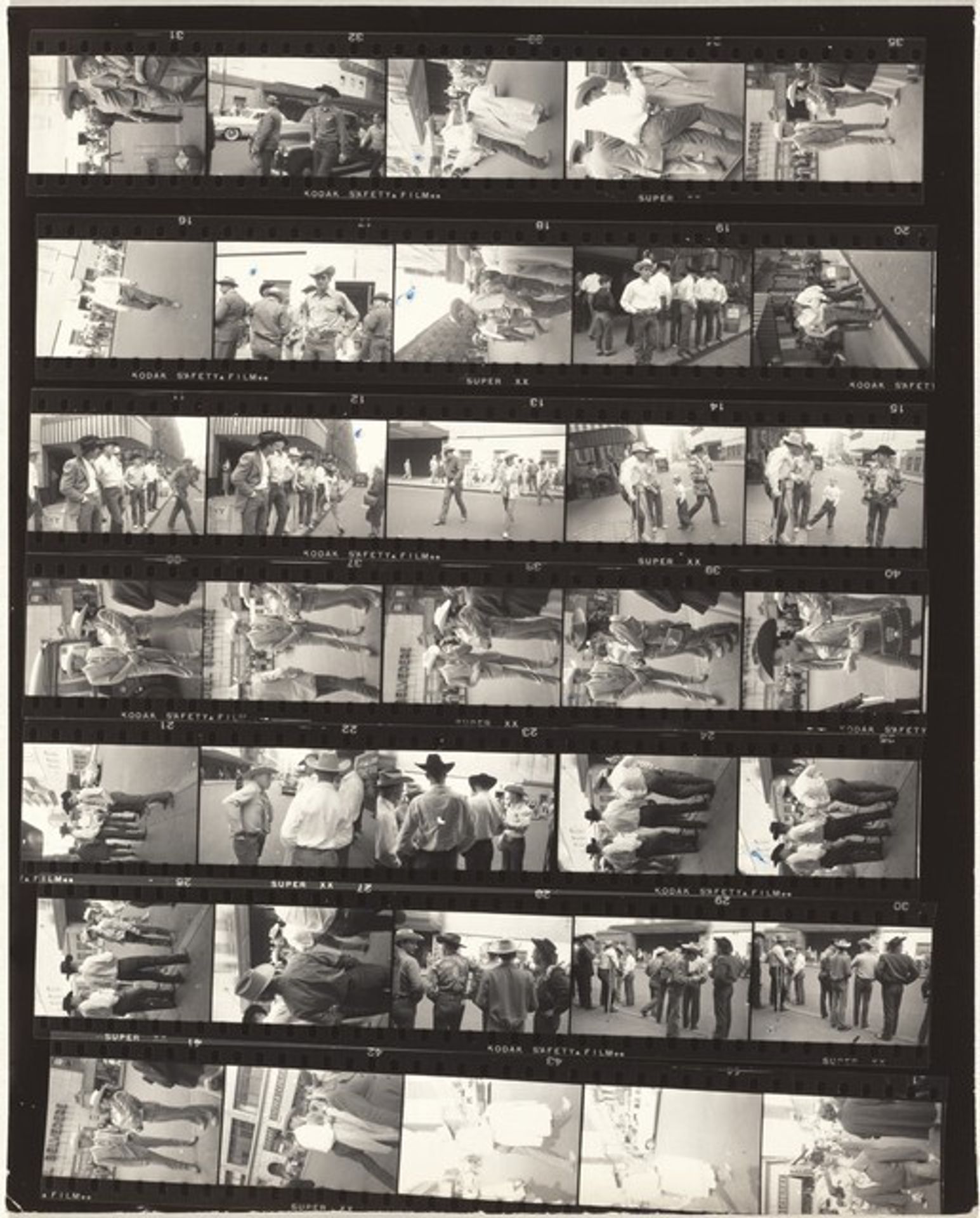 Cowboys no number by Robert Frank