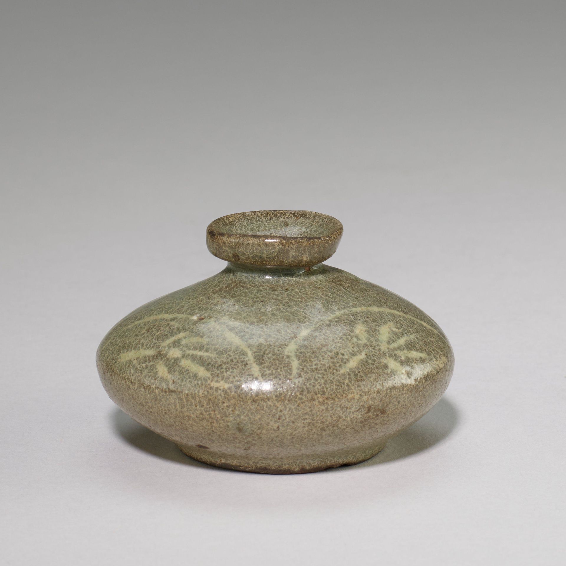 Oil jar with floral motifs by Anonymous