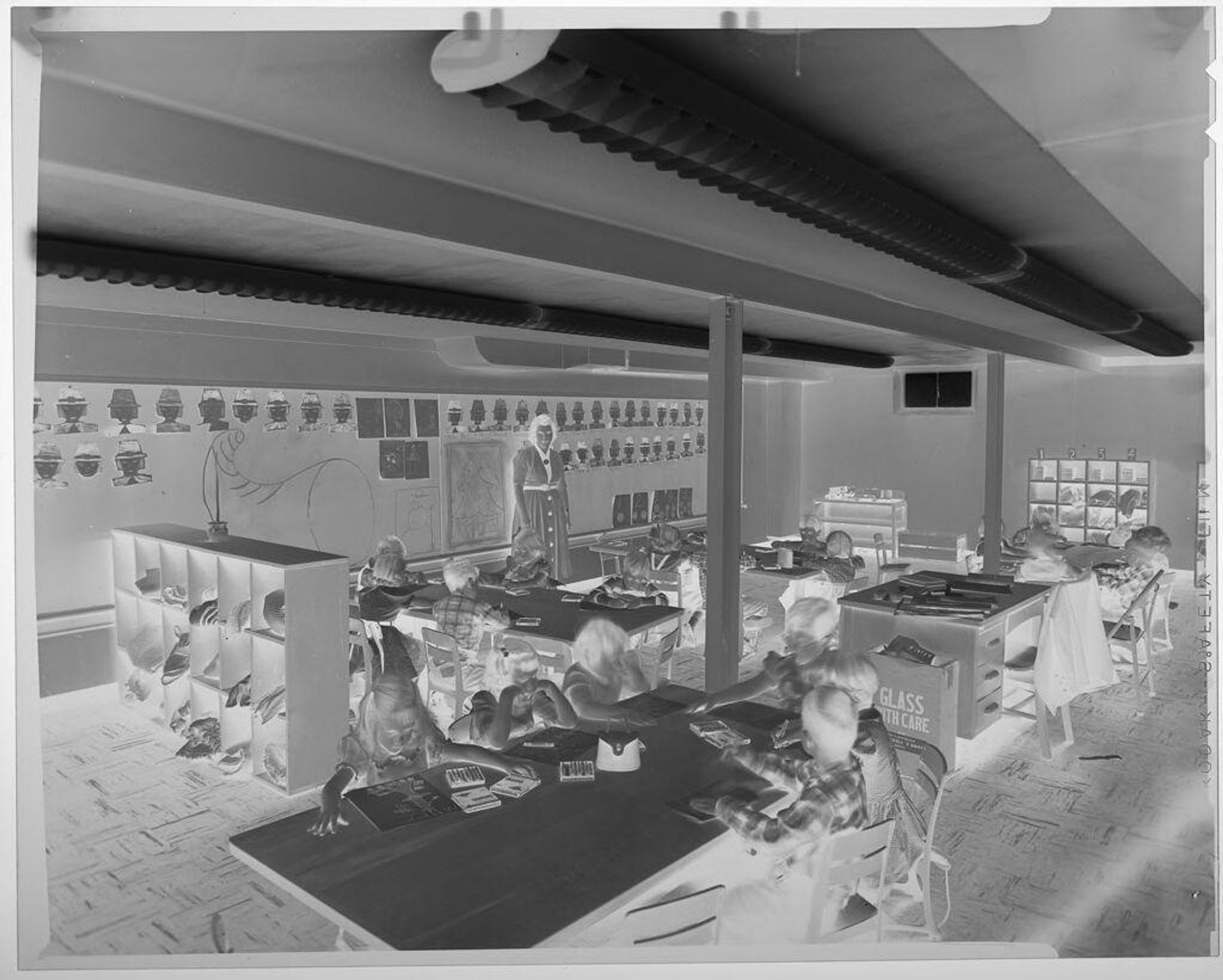 Untitled (elementary school classroom with children and teacher) by Jack Gould