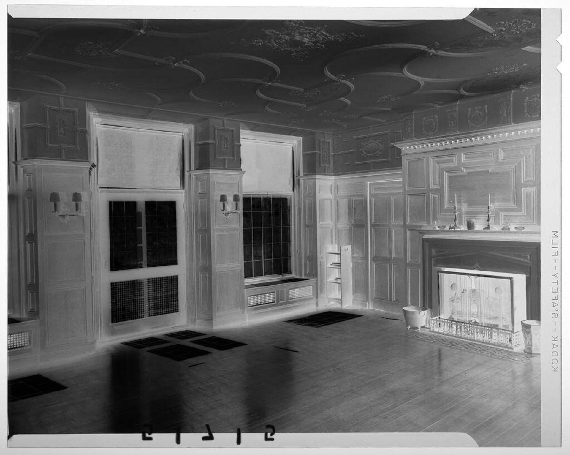 Untitled (interior view of part of large empty drawing room with fireplace) by Martin Schweig