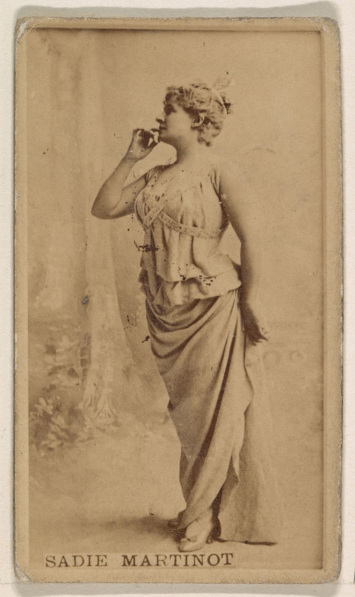 Sadie Martinot, from the Actresses series (N245) issued by Kinney Brothers to promote Sweet Caporal Cigarettes by Kinney Brothers Tobacco Company