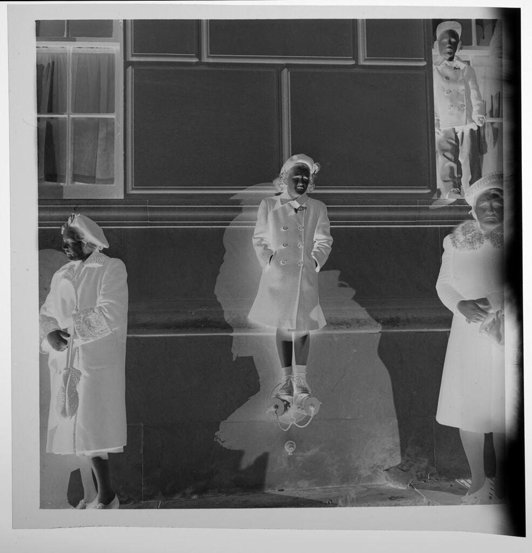 Untitled (girl standing on drain coming out of wall) by Jack Gould