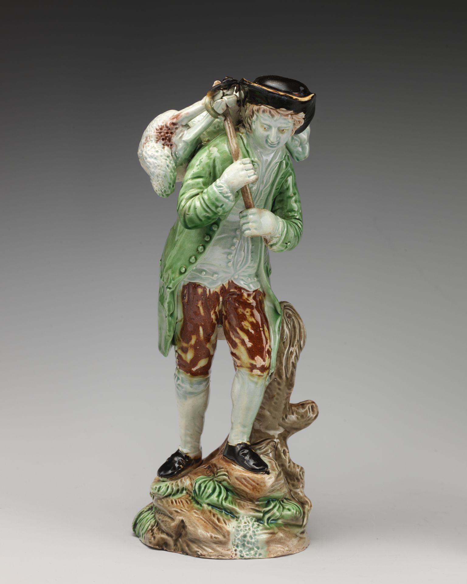 Farmer carrying trussed sheep over his shoulder by Ralph Wood the Younger