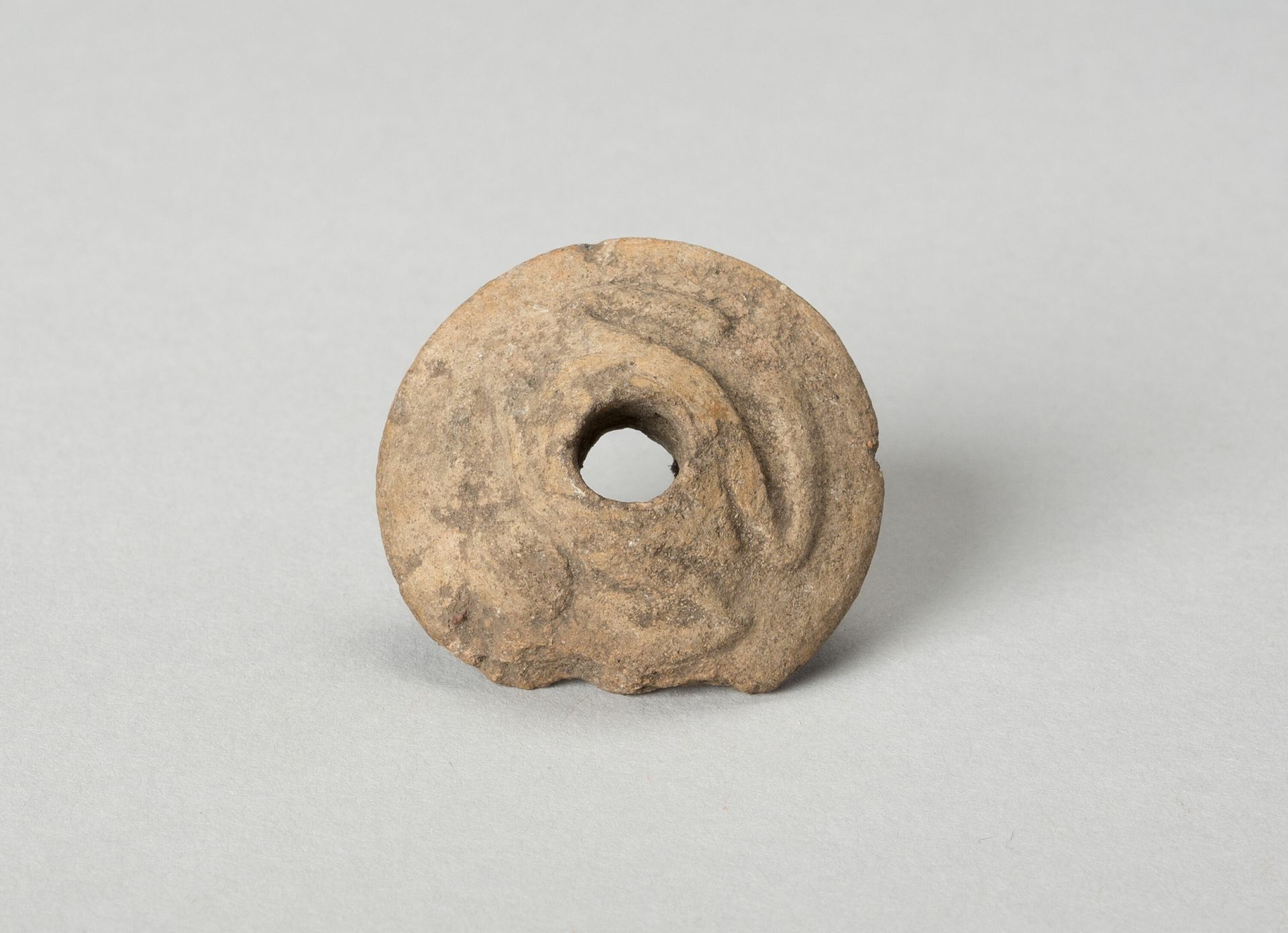 Ear Ornament or Spindle Whorl with Modeled Frog Motifs by Aztec (Mexica)