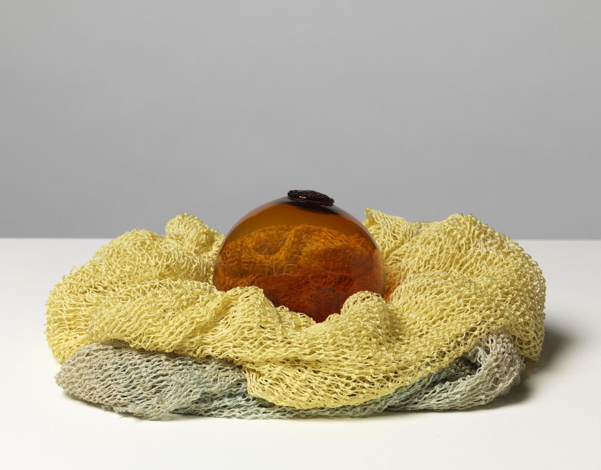 Inscribed Glass Float and Nets by  Ian Hamilton Finlay
