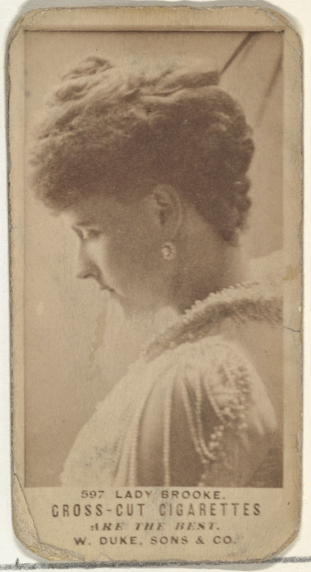 Card Number 597, Lady Brooke, from the Actors and Actresses series (N145-3) issued by Duke Sons & Co. to promote Cross Cut Cigarettes by W. Duke, Sons & Co.