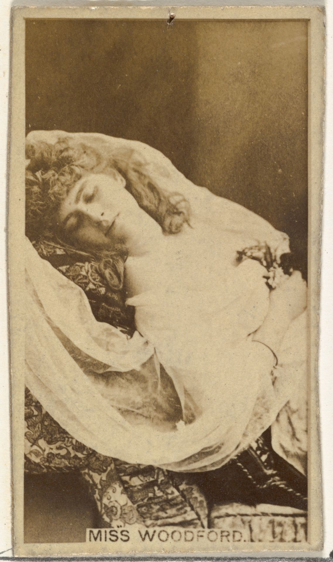 Miss Woodford, from the Actors and Actresses series (N145-8) issued by Duke Sons & Co. to promote Duke Cigarettes by W. Duke, Sons & Co.