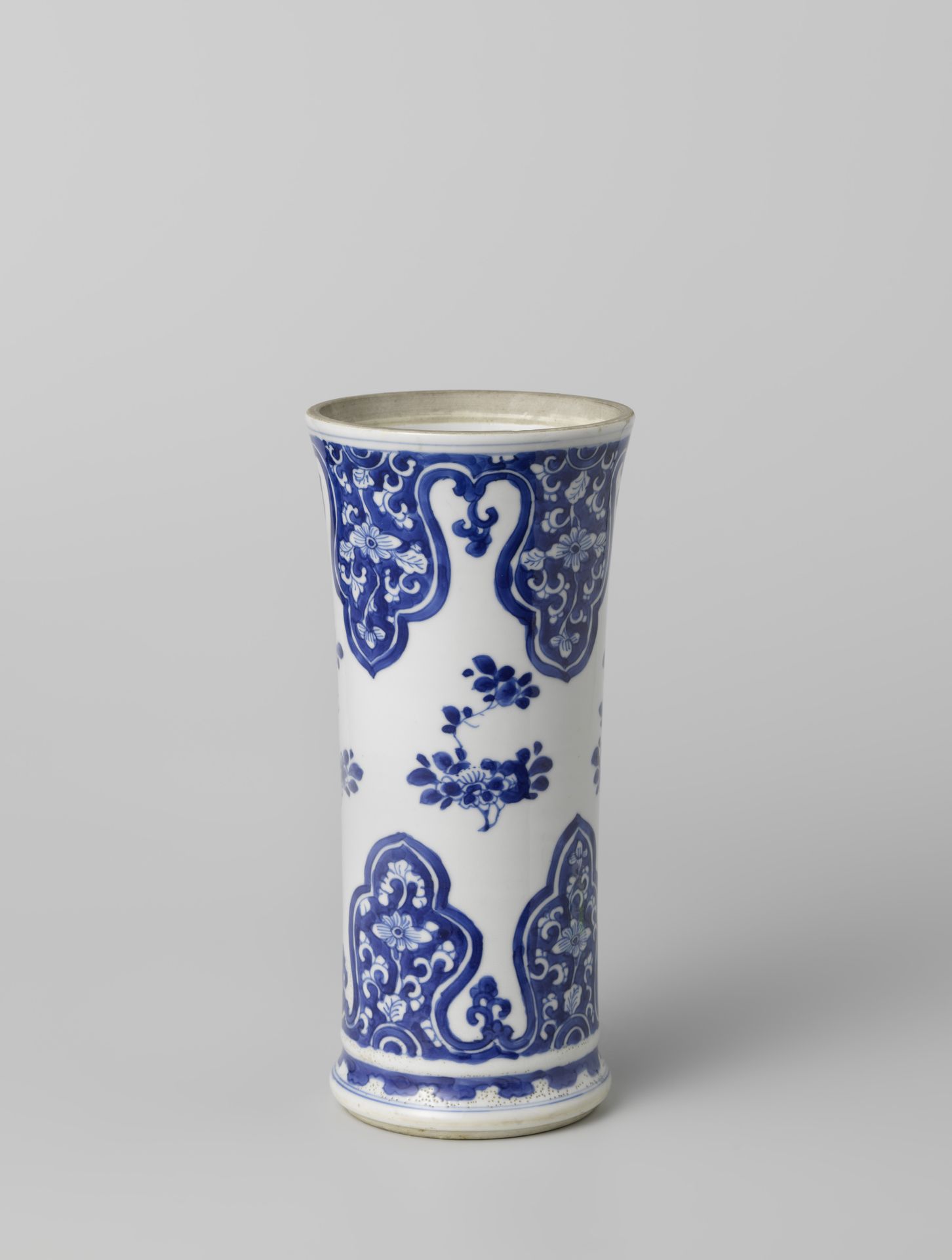 Beaker vase with flower sprays and floral scrolls in reserve in lambrequins by Anonymous
