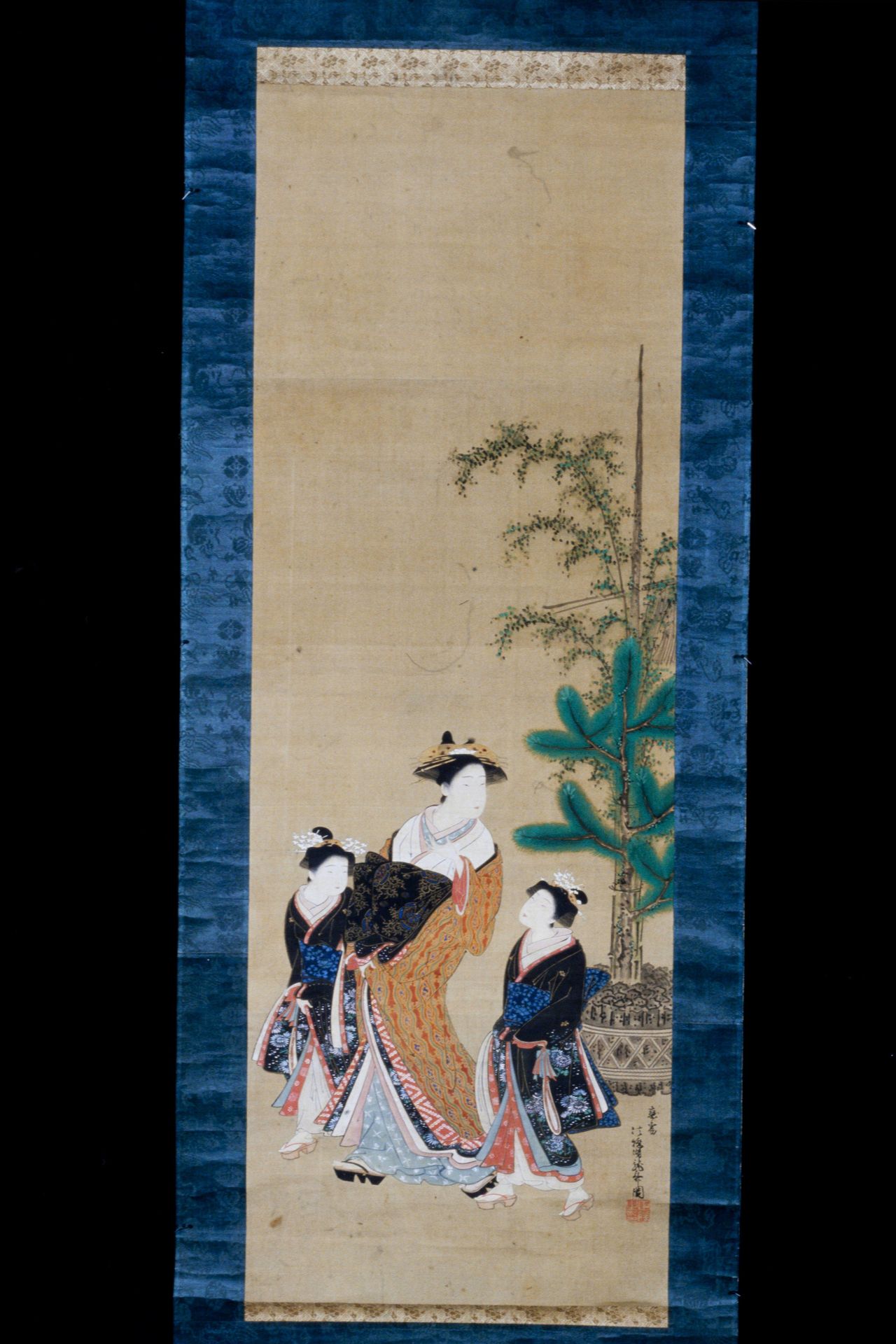 Prostitute with Two Attendants by Isoda Koryūsai