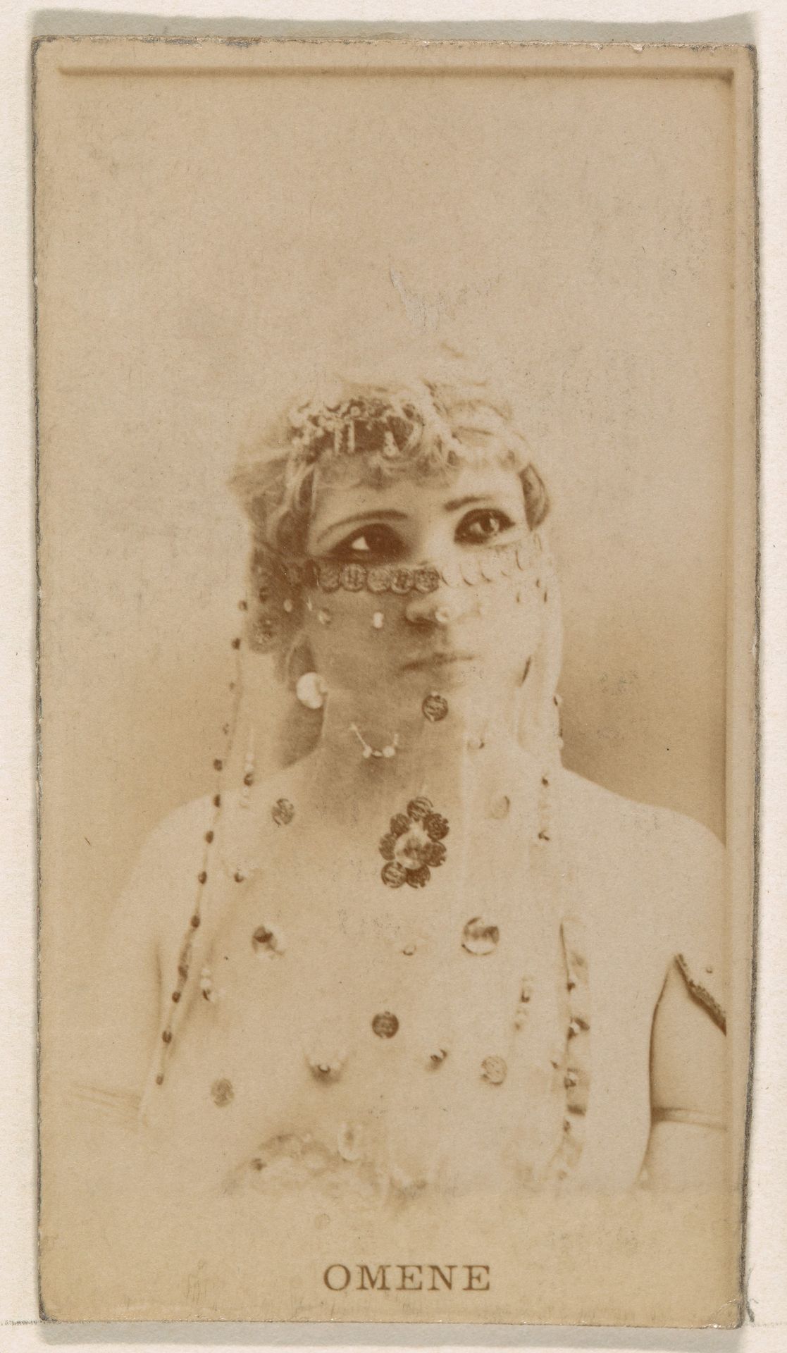 Omene, from the Actresses series (N245) issued by Kinney Brothers to promote Sweet Caporal Cigarettes by Kinney Brothers Tobacco Company