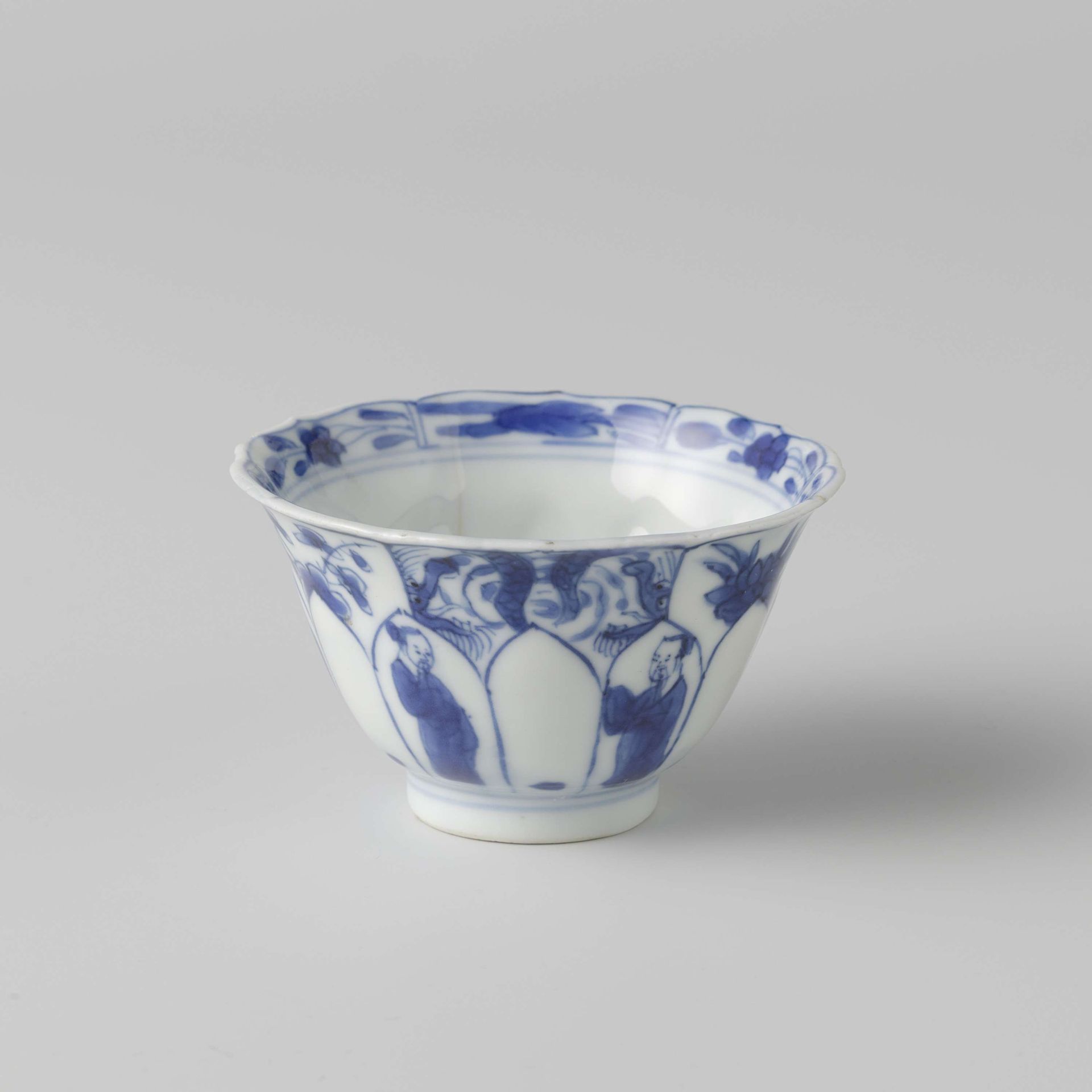 Bell-shaped cup with Chinese figures, dragons and flower sprays and the bottom moulded in the shape of flower petals by Anonymous