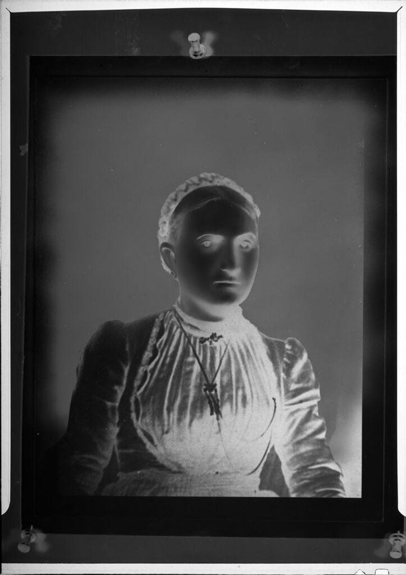 Untitled (picture of woman pinned to wall) by Robert Burian