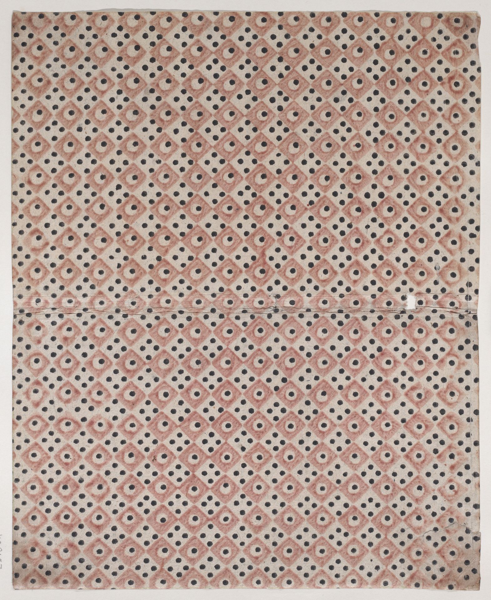 Book cover with overall pattern of red and black squares and dots by Anonymous