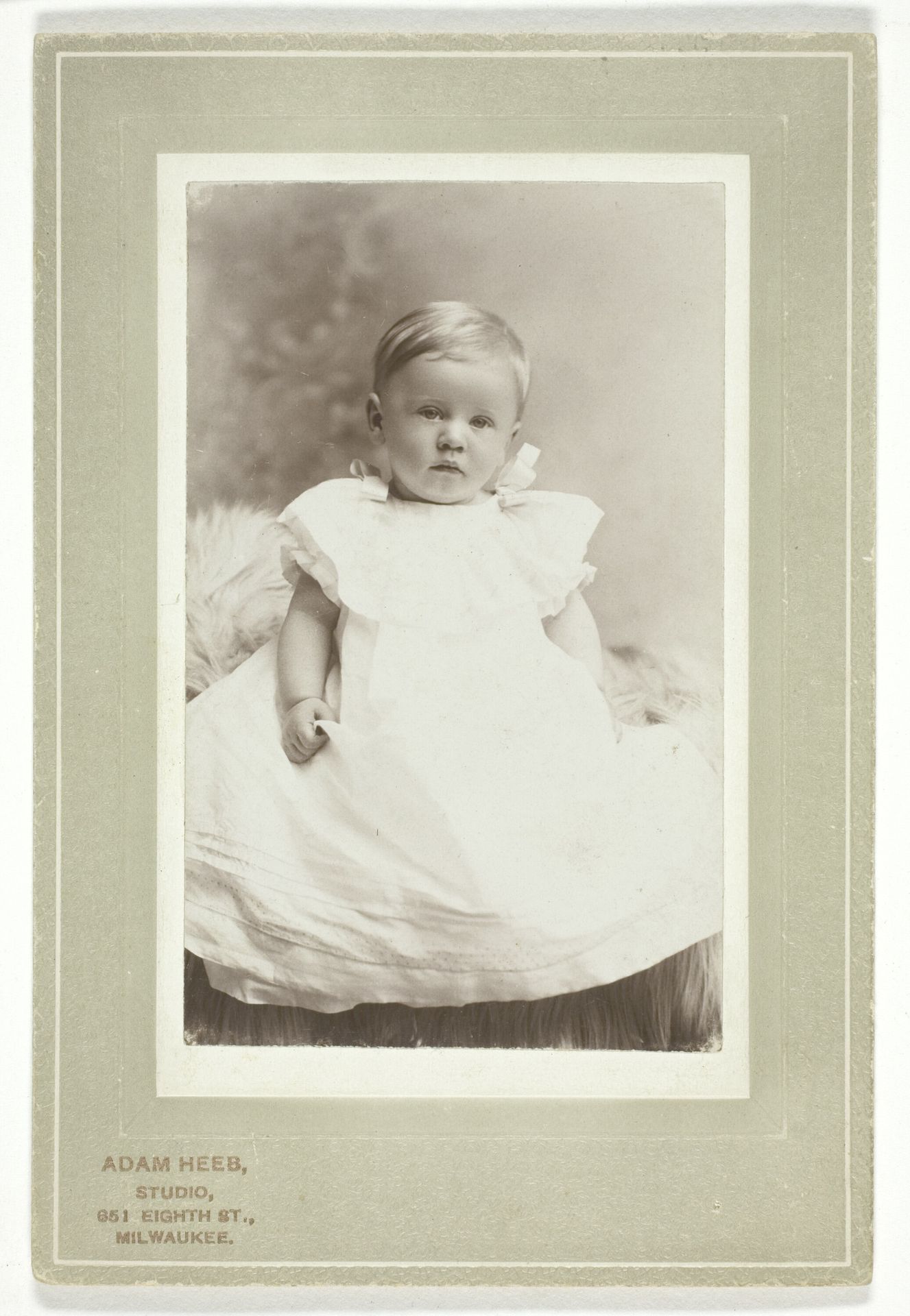 Hugo Tscharuack (in white christening dress) by Adam Heeb