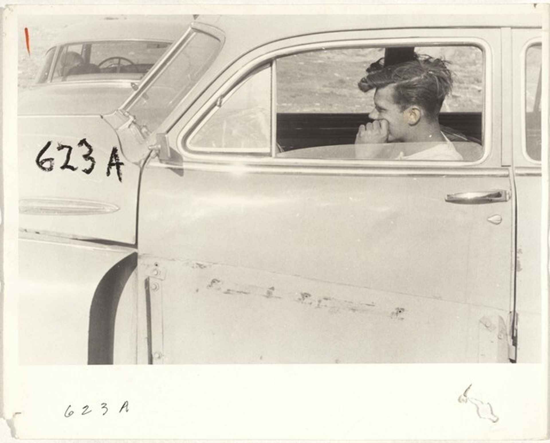 Man seated in automobile--San Francisco by Robert Frank
