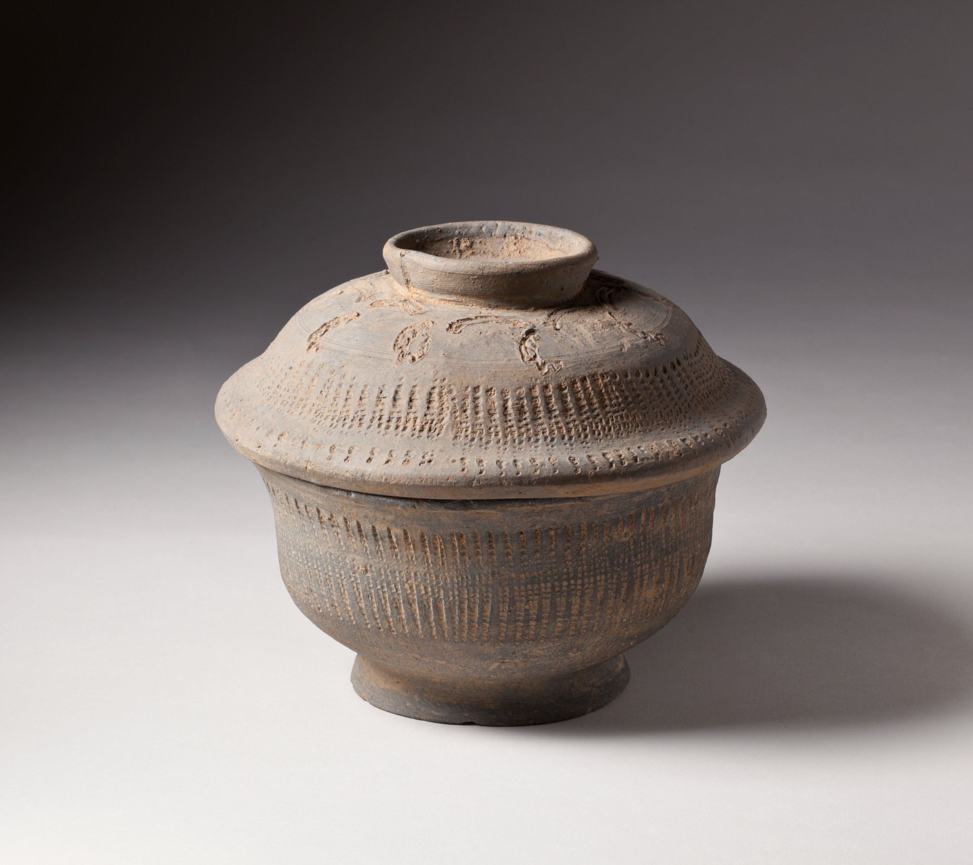 Covered Bowl with abstract and geometric pattern by Anonymous