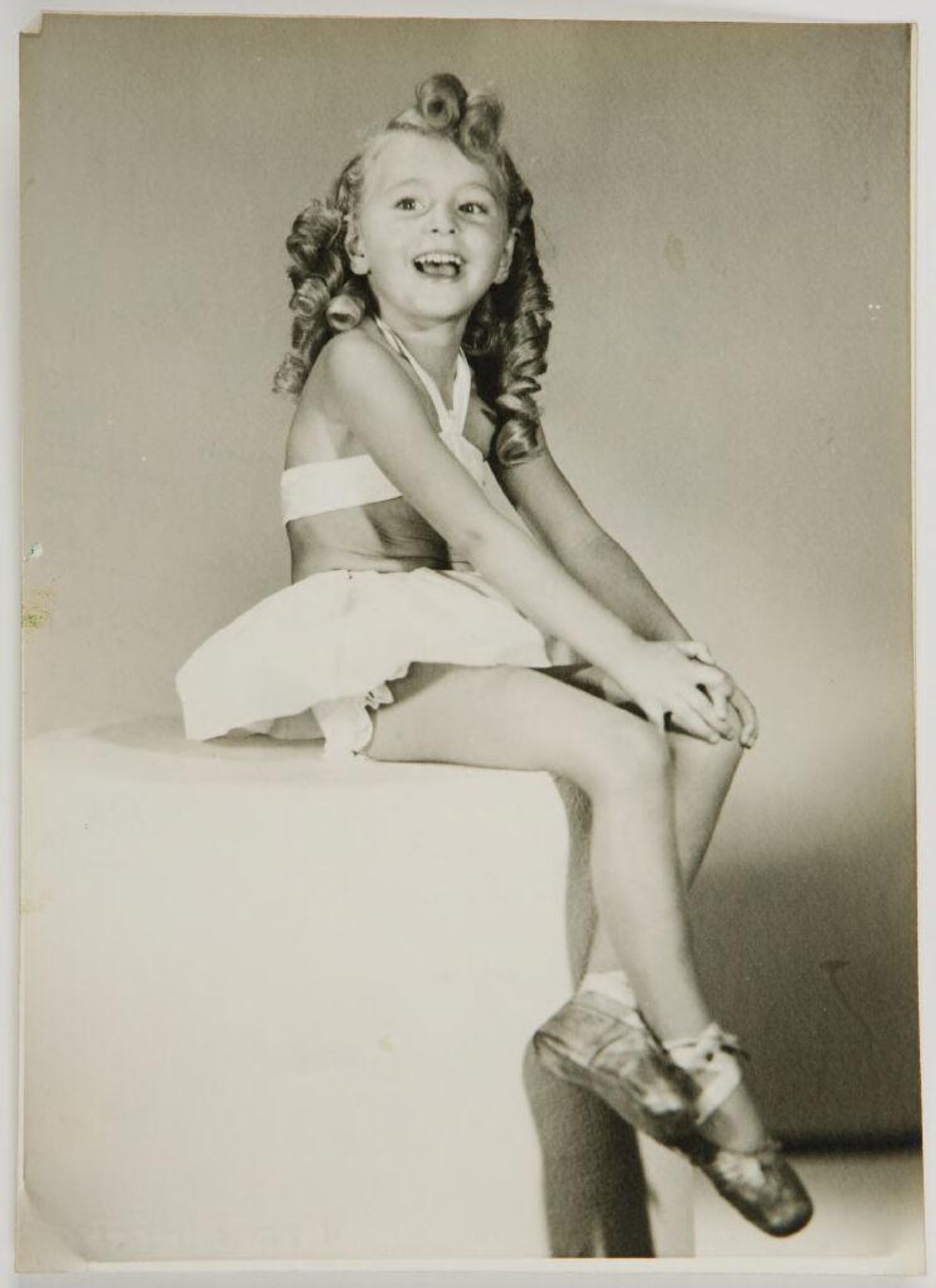 Untitled (little girl posing as ballerina) by Ken Whitmire Associates