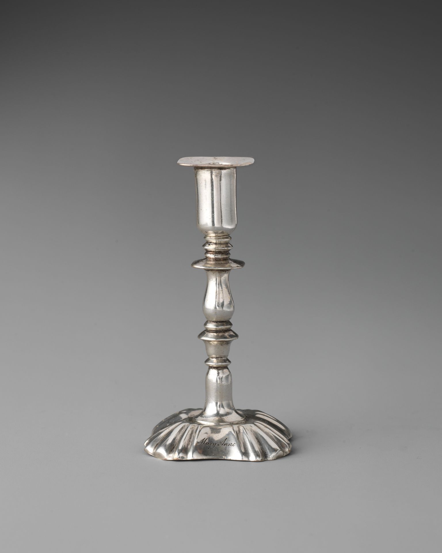 Miniature candlestick (one of a pair) by Henry Flavelle