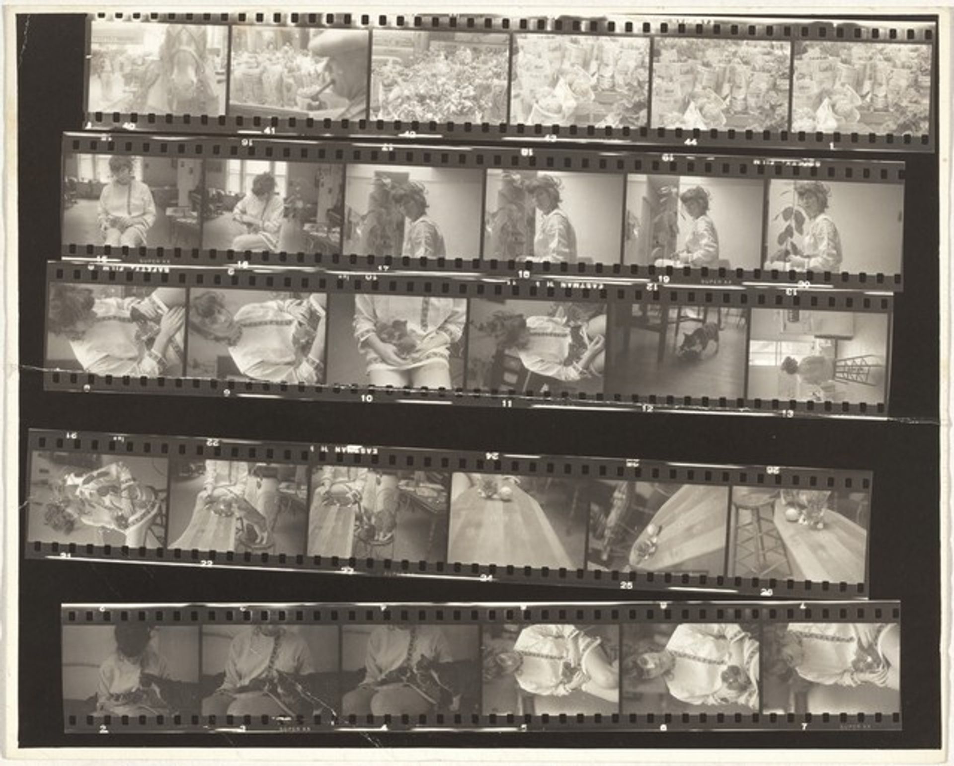 Mary with cats--Children and family no number by Robert Frank