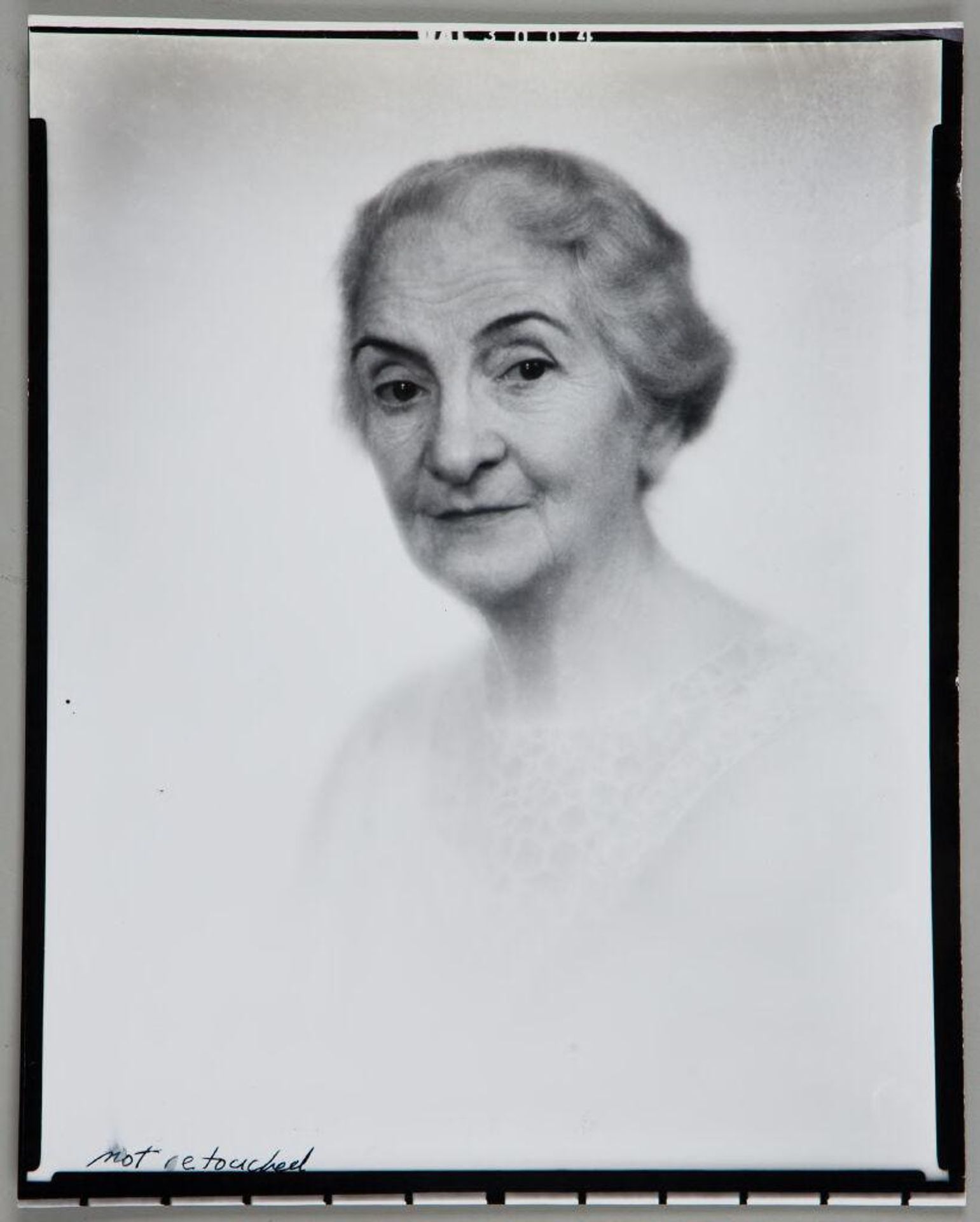Untitled (unretouched portrait of older woman) by Paul Gittings