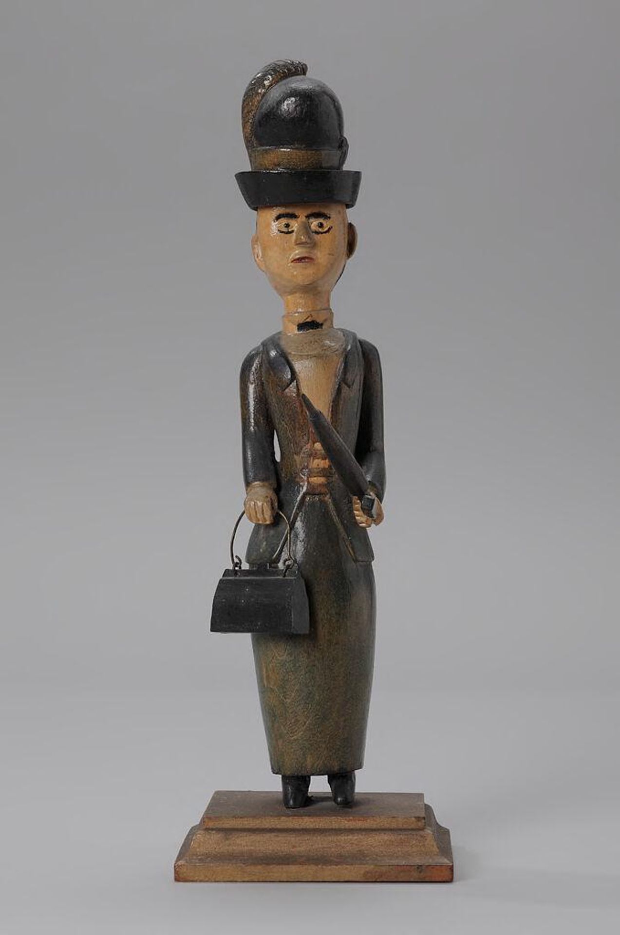 Two Suffragettes (figure with an umbrella) by Michael Rothloff