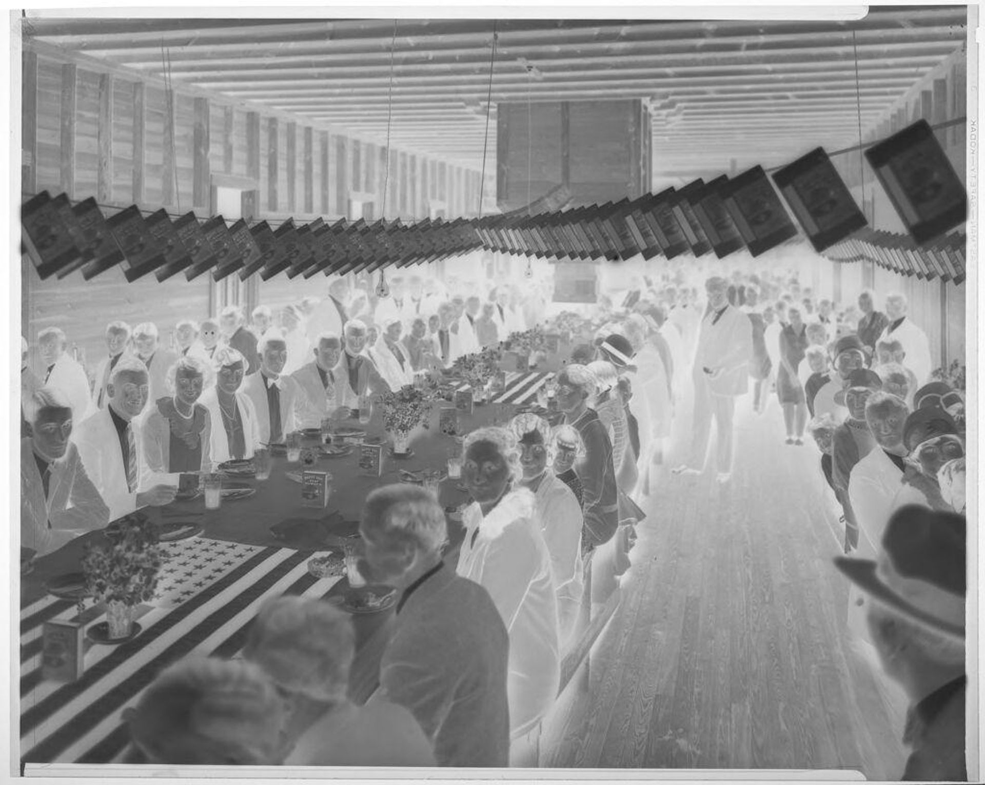 Untitled (diners seated at long tables with Happy Day Soap Powder) by Hamblin Studio