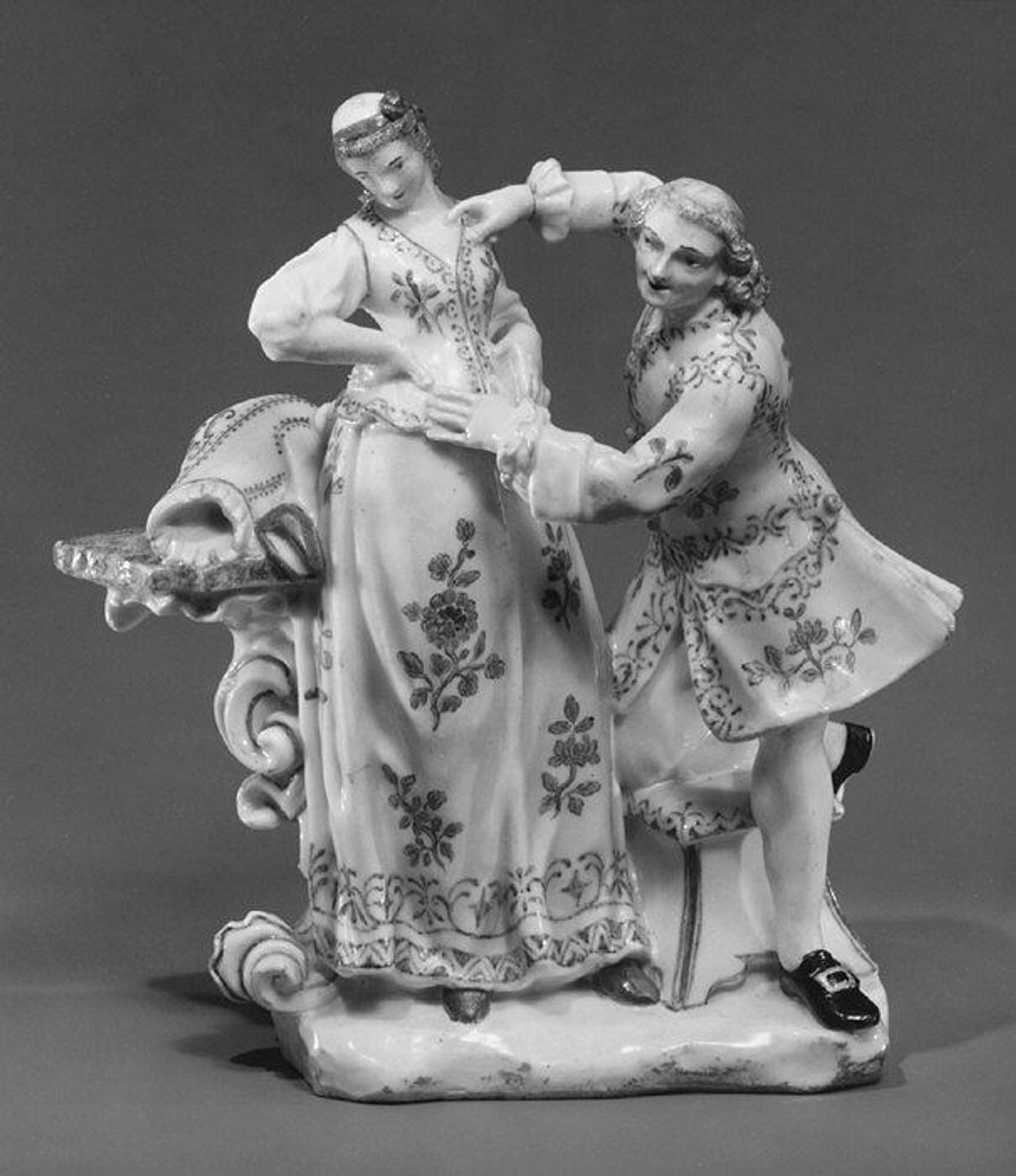 Woman and her tailor by Capodimonte Porcelain Manufactory