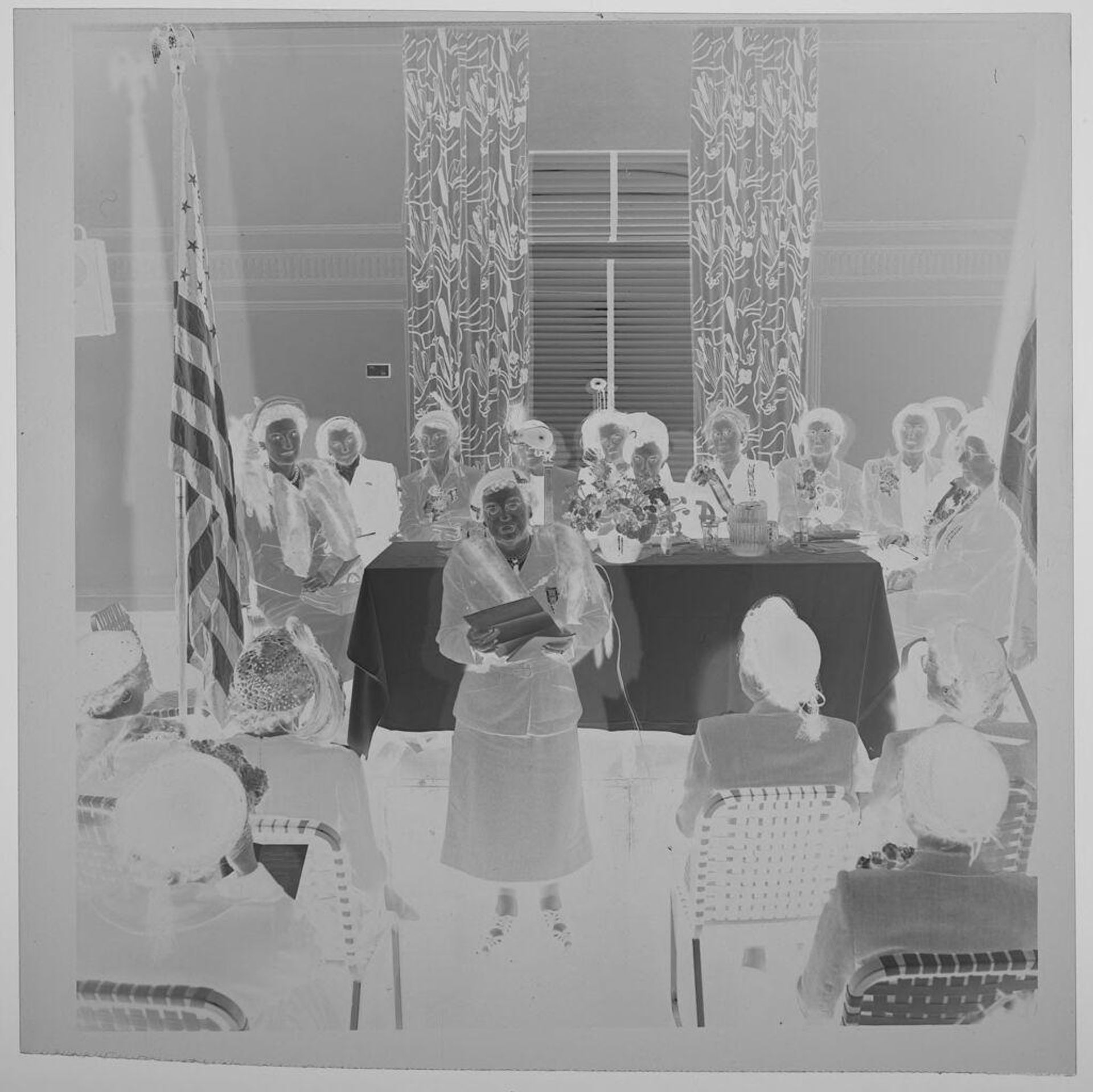 Untitled (elderly women at DAR meeting, one standing and reading) by Jack Gould