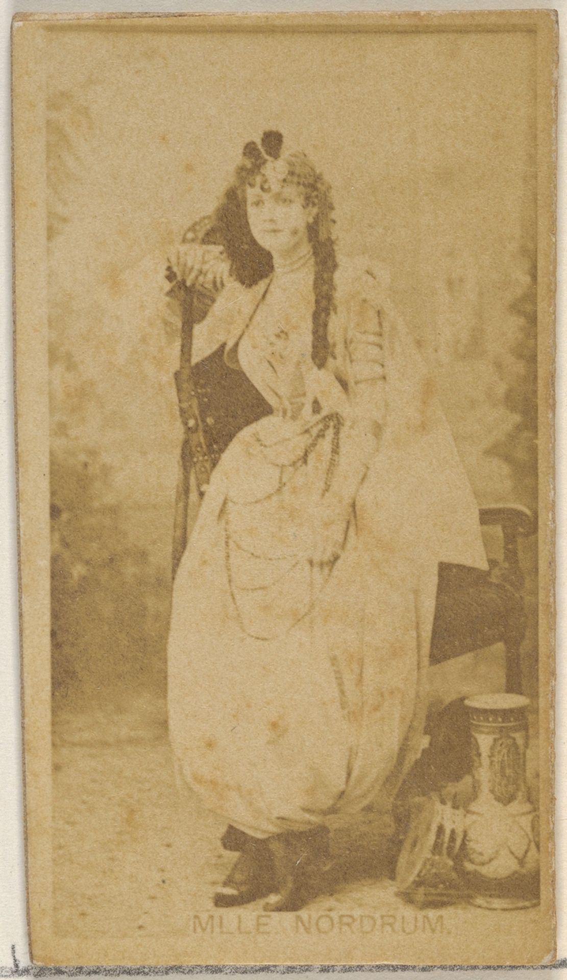 Mlle. Nordrum, from the Actors and Actresses series (N45, Type 8) for Virginia Brights Cigarettes by Allen & Ginter