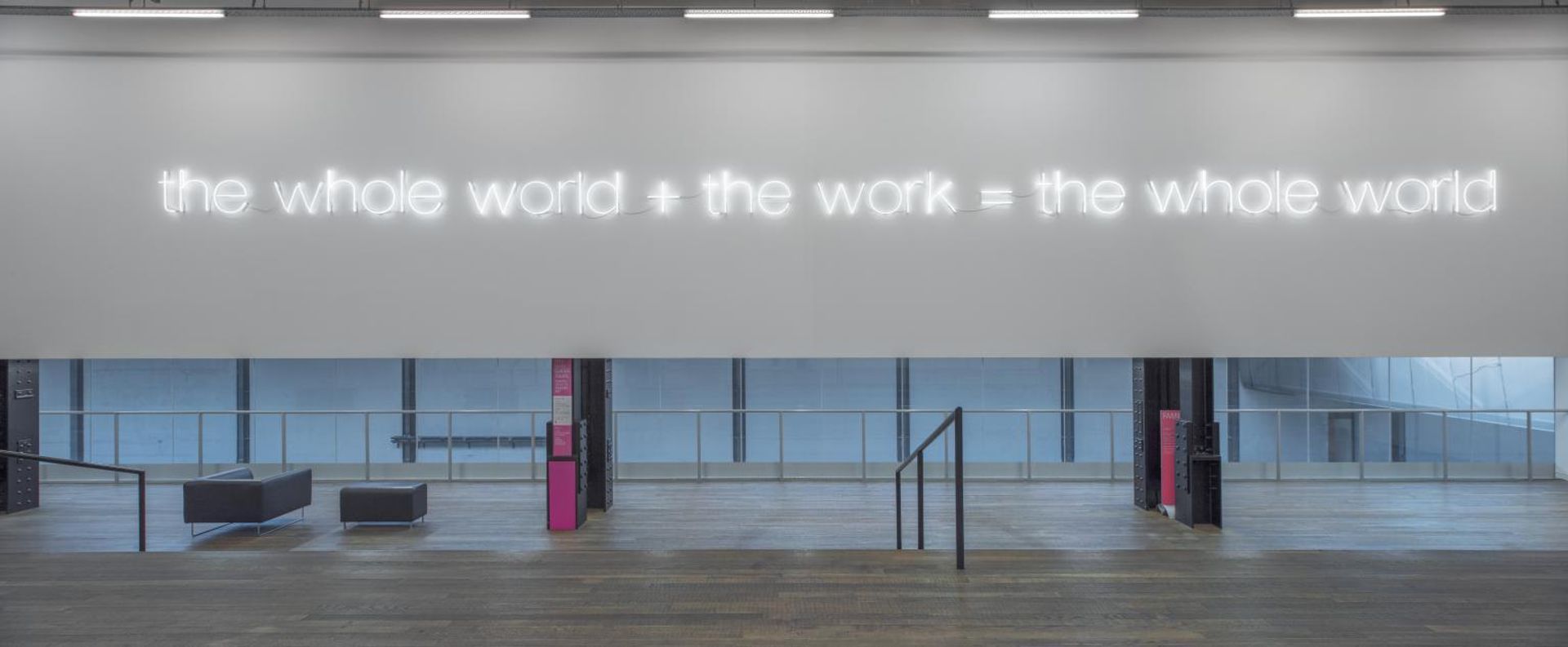 Work No. 232: the whole world + the work = the whole world by  Martin Creed