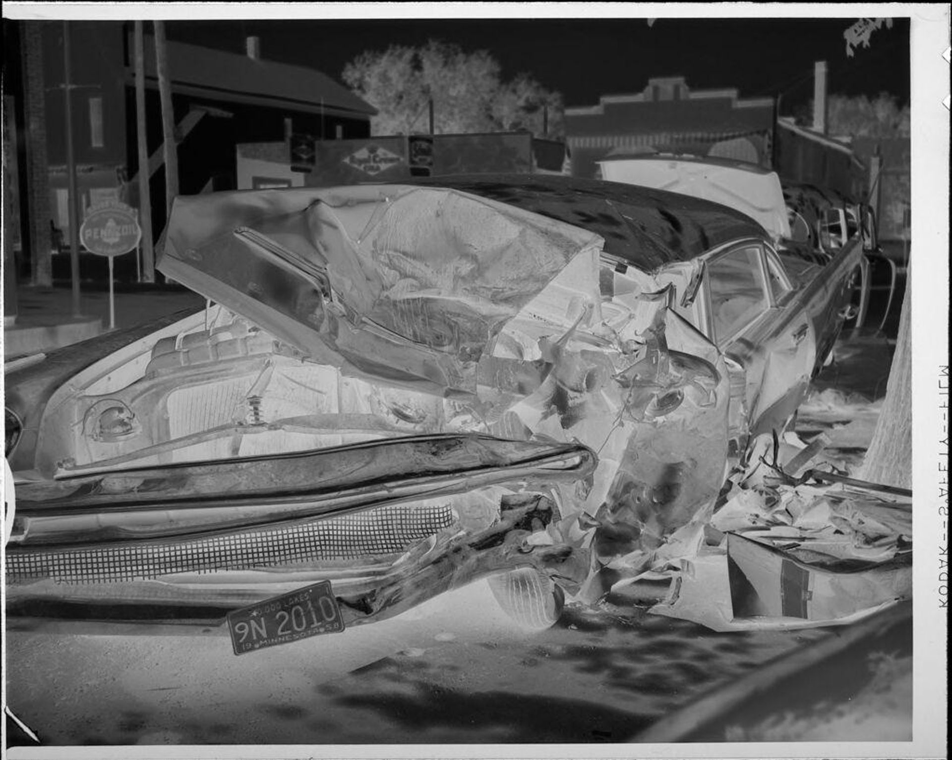 Untitled (car wrecked in crash) by Lucian and Mary Brown