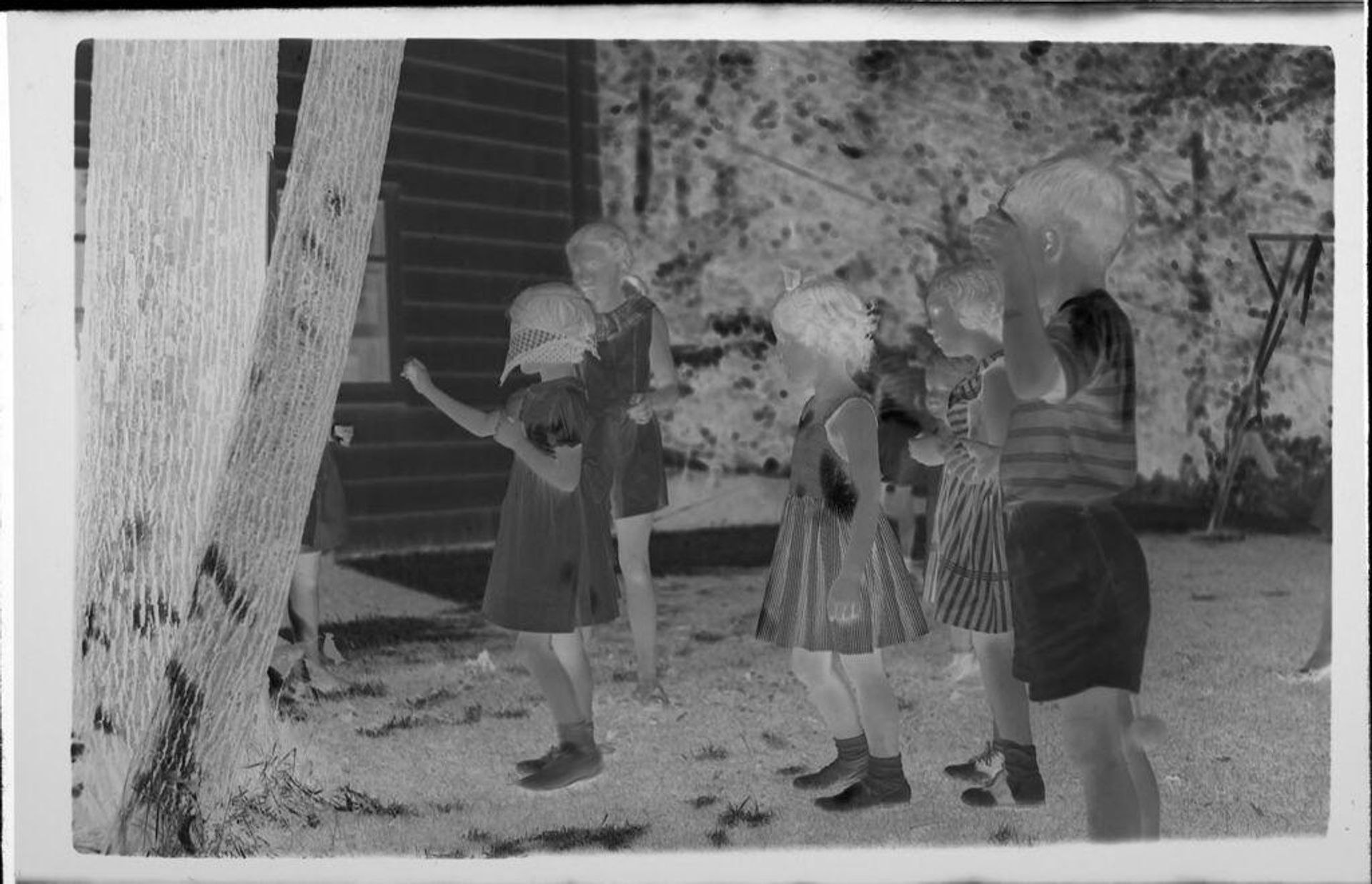 Untitled (children playing blind man's bluff) by Lucian and Mary Brown