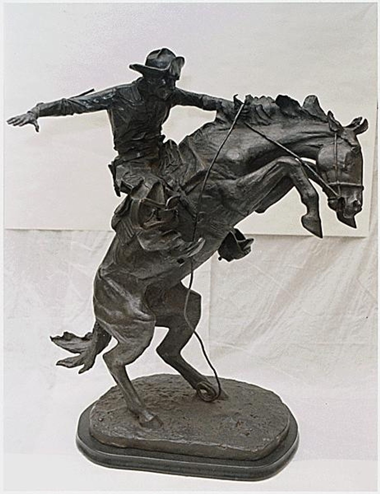 The Broncho Buster by Frederic Remington