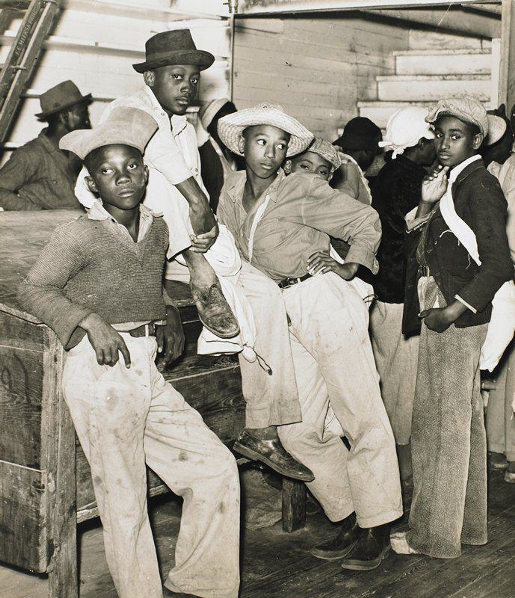Cotton Pickers Waiting in Line to be Paid Off in Plantation Store by Marion Post Wolcott