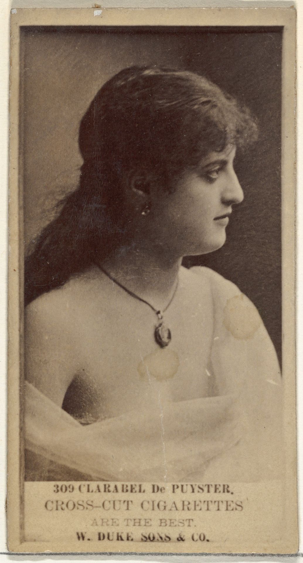 Card Number 309, Clarabel De Puyster, from the Actors and Actresses series (N145-3) issued by Duke Sons & Co. to promote Cross Cut Cigarettes by W. Duke, Sons & Co.