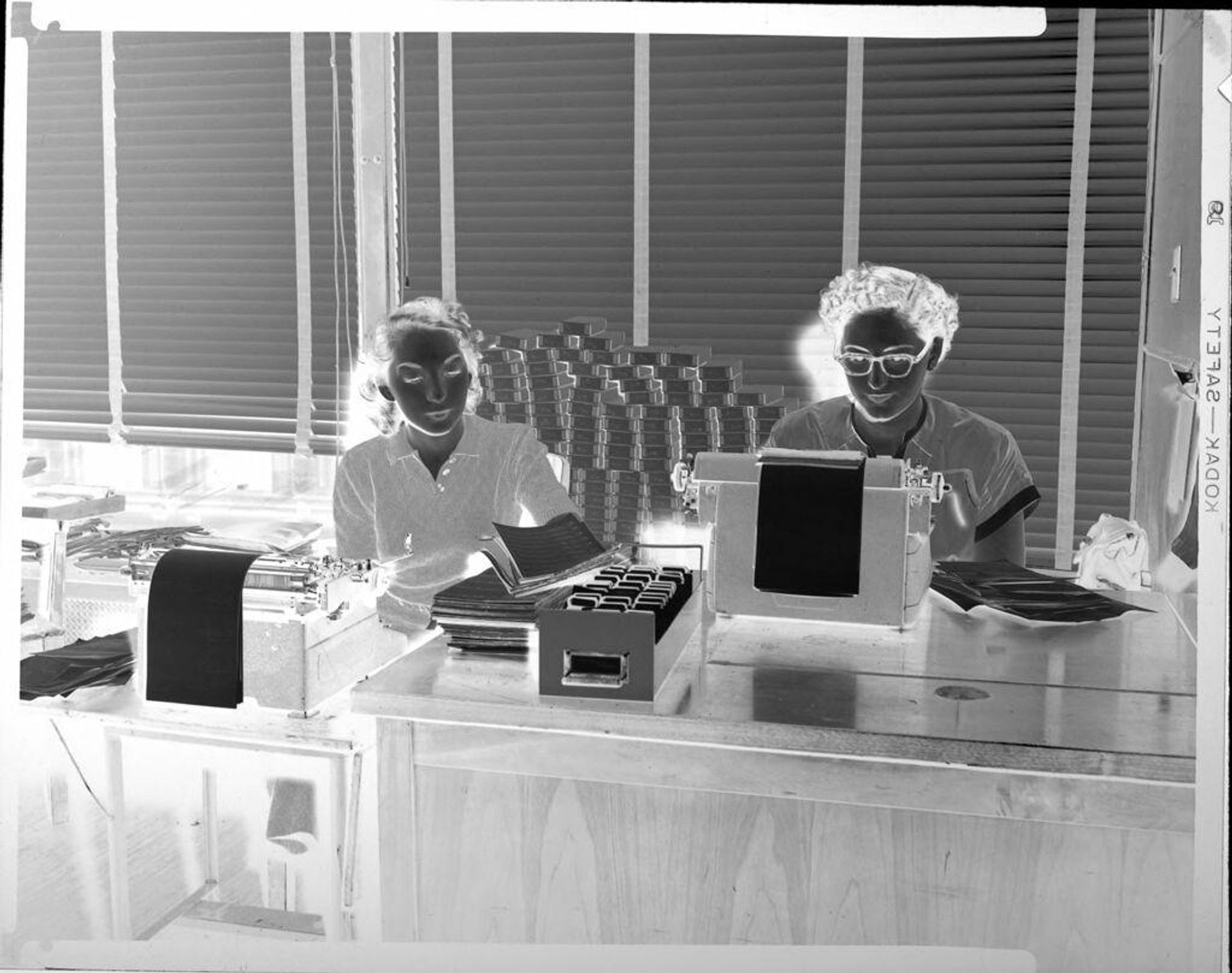 Untitled (women typing) by Peter James Studio
